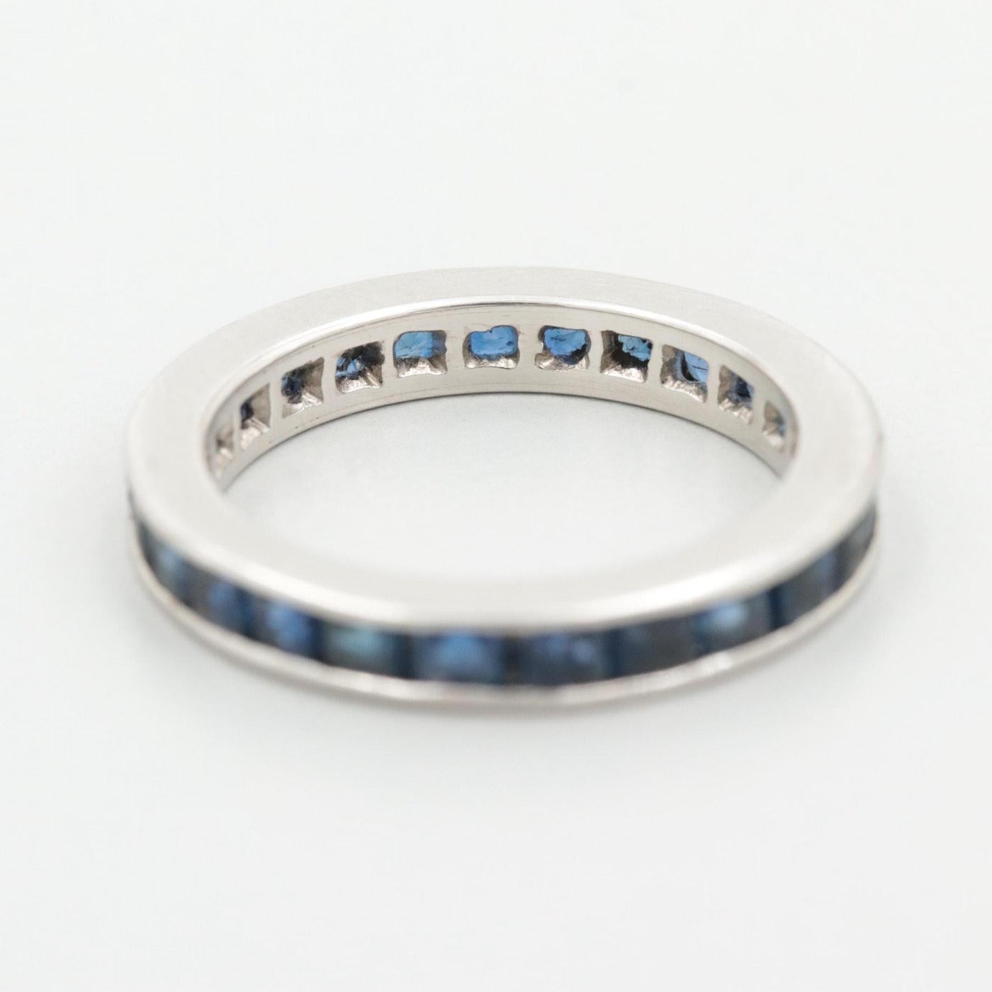 Description: 
This piece is a 1950s Art Deco style Platinum wedding band with 2.2 cttw French Cut natural sapphires! A perfect band with a pop of color with beautiful blue sapphires that will pair with your engagement ring on your special day!!