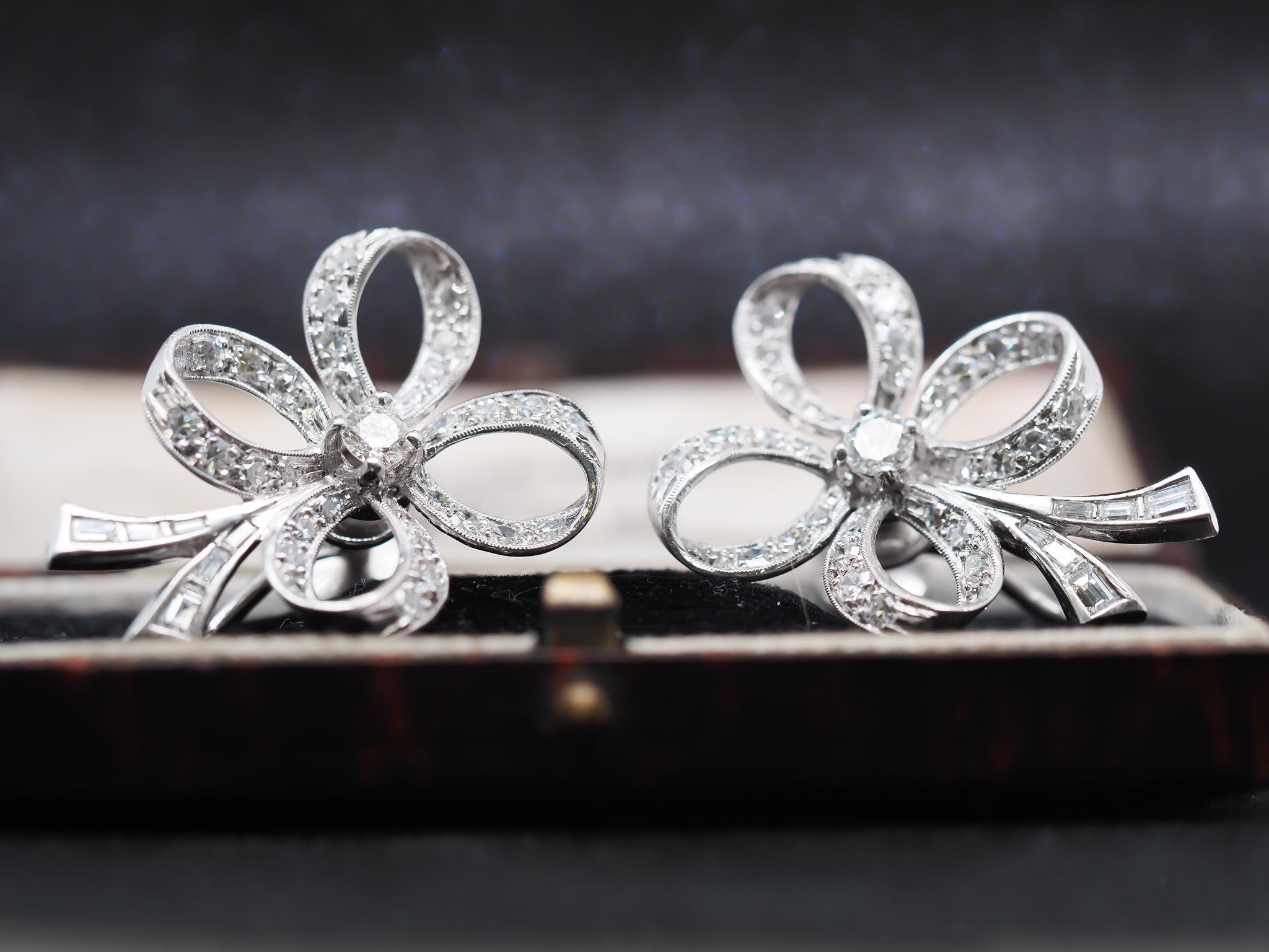 Year: 1950s
Item Details:
Metal Type: Platinum [Hallmarked, and Tested]
Weight: 12.0 grams
Diamond Details:
Weight: 1.50ct total weight.
Cut: Old Transitional Rounds, Baguettes.
Color: F
Clarity: VS
Measurements: 1.25 inch long
Condition: Excellent