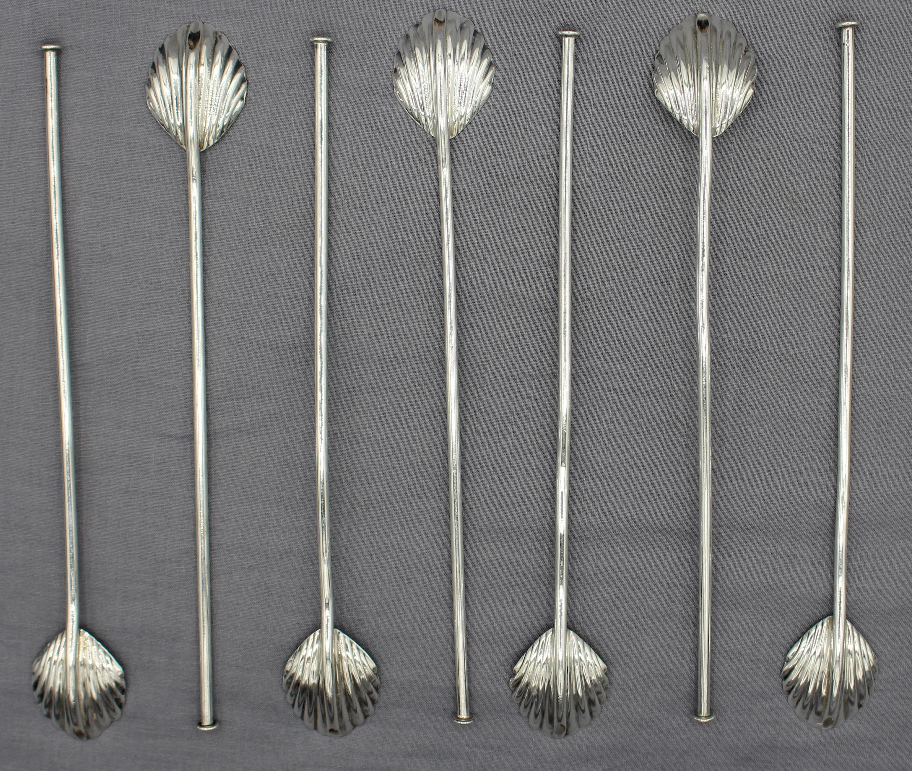 Circa 1950s set of 7 sterling silver sipping spoons, probably Mexico. Elegant shell bowls. Marked 925. Illegible hallmarks. 2.30 troy oz. 7 11/16