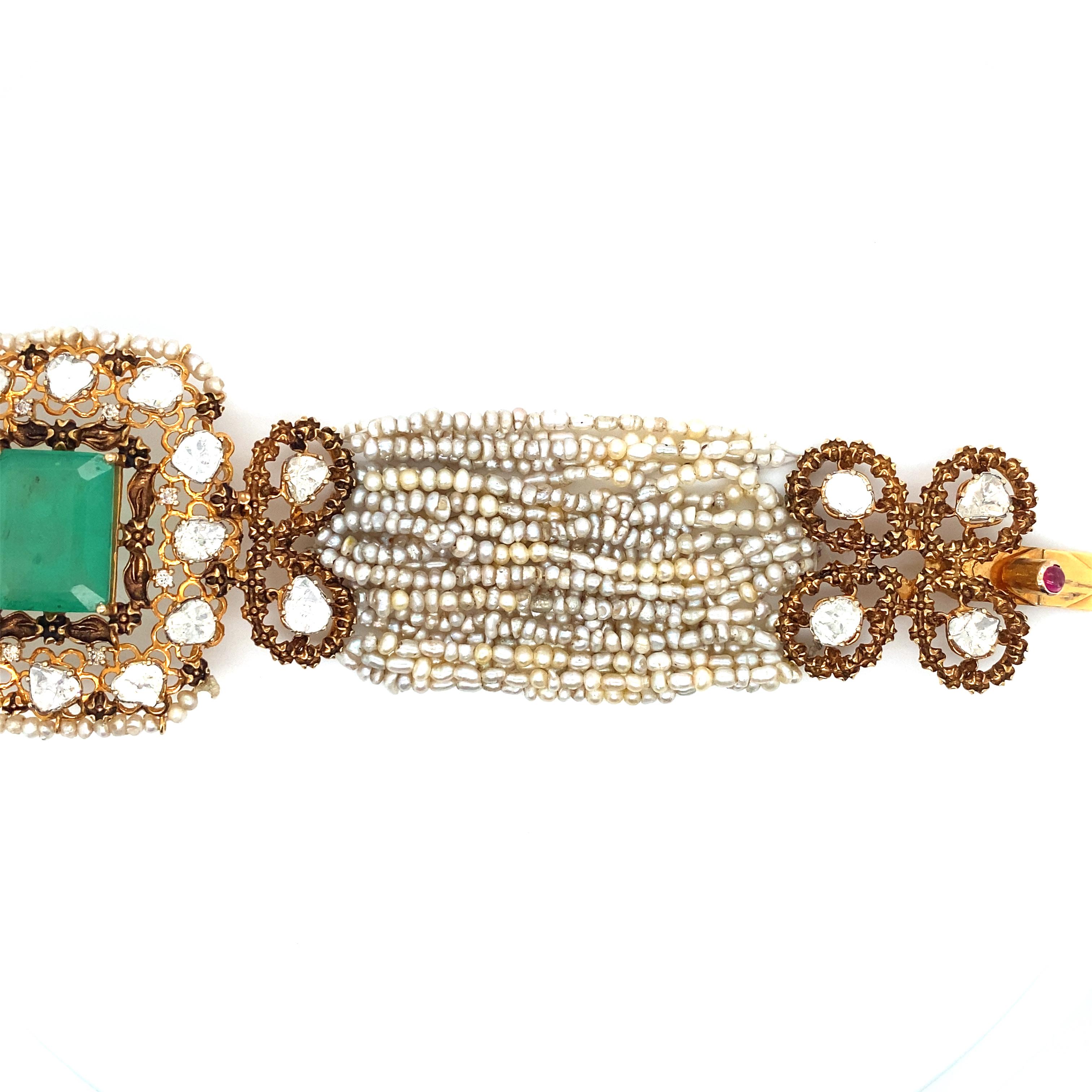 Emerald Cut Victorian Revival Seed Pearl and Emerald Bracelet in 14 Karat Gold, circa 1950s  For Sale