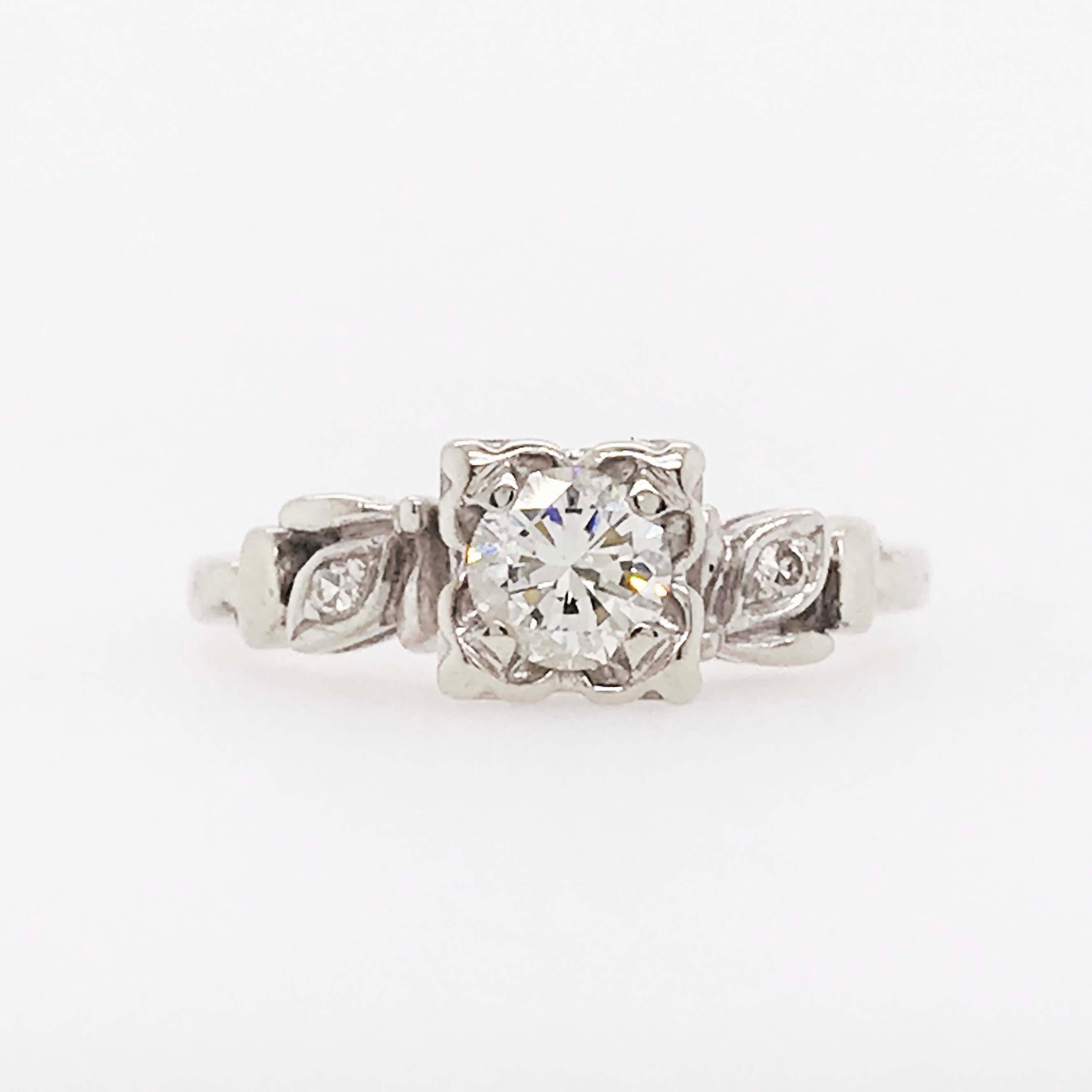 This CIRCA 1953 estate engagement ring is stunning! With an almost half carat diamond set in the center (0.44 ct) in the original setting. This ring has all the original diamonds and metal! It's in fantastic shape and still look as amazing as it did