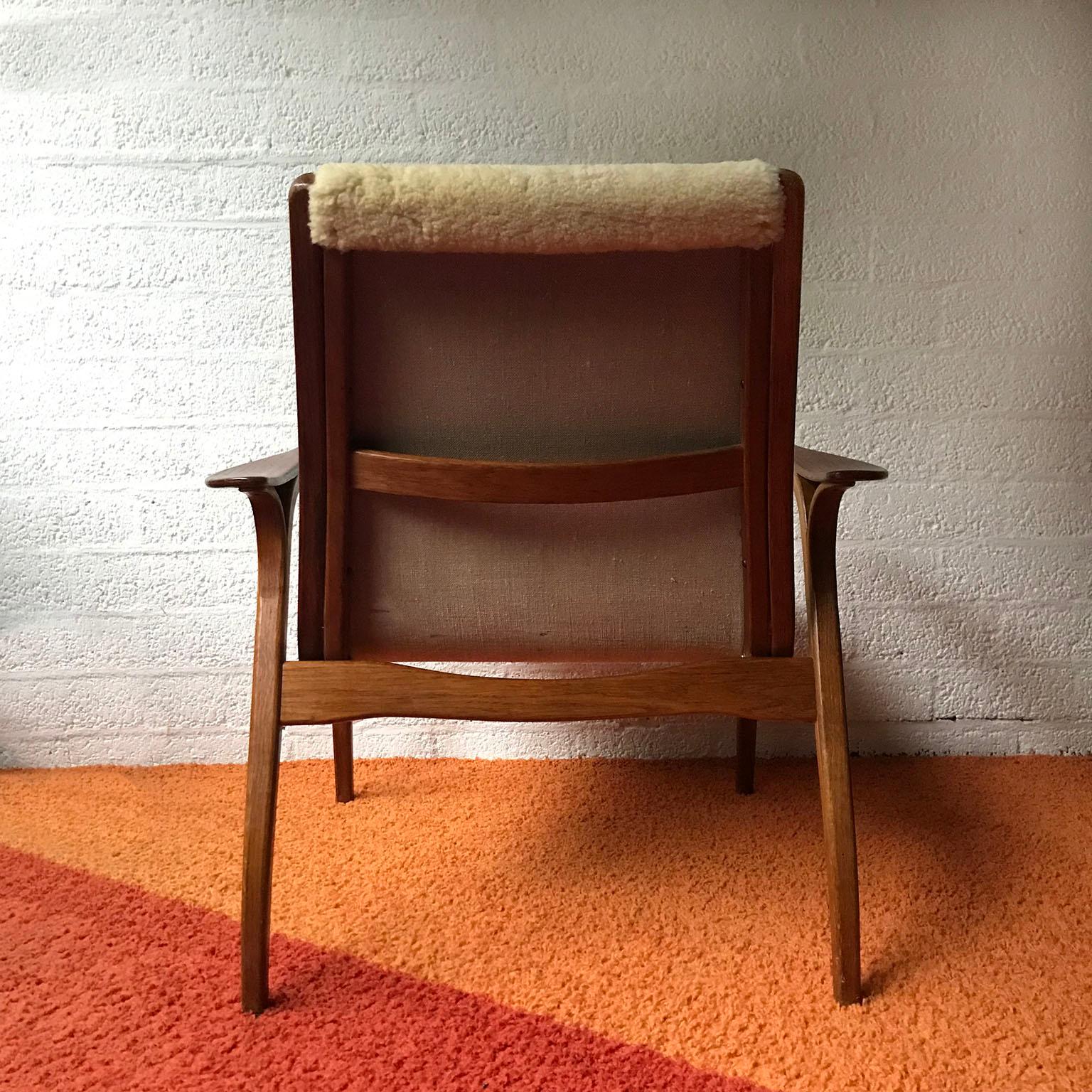 Swedish 1956, Yngve Ekström for Swedese Møbler, Lamino Chair with sheep Skin
