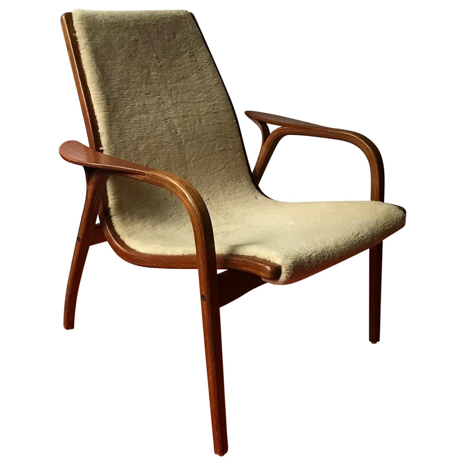 1956, Yngve Ekström for Swedese Møbler, Lamino Chair with sheep Skin