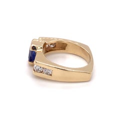 Circa 1960s 1.0 Carat Tanzanite and Diamond Asymmetrical Ring in 14K Gold
