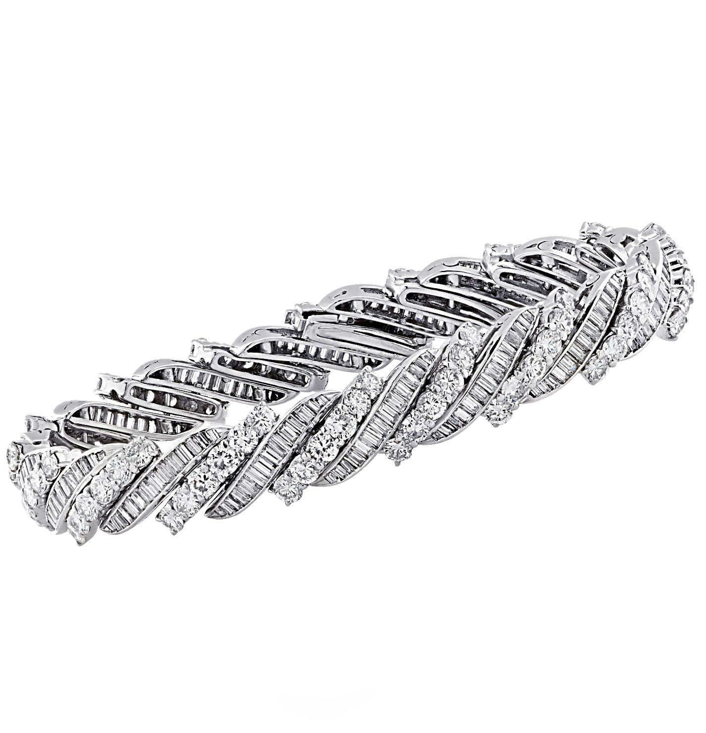 Spectacular mid-century diamond bracelet, circa 1960s, crafted in platinum, showcasing 268 mixed cut diamonds weighing approximately 13 carats total, F color, VS clarity. Typical of the 1960s, this stunning bracelet features alternating rows of