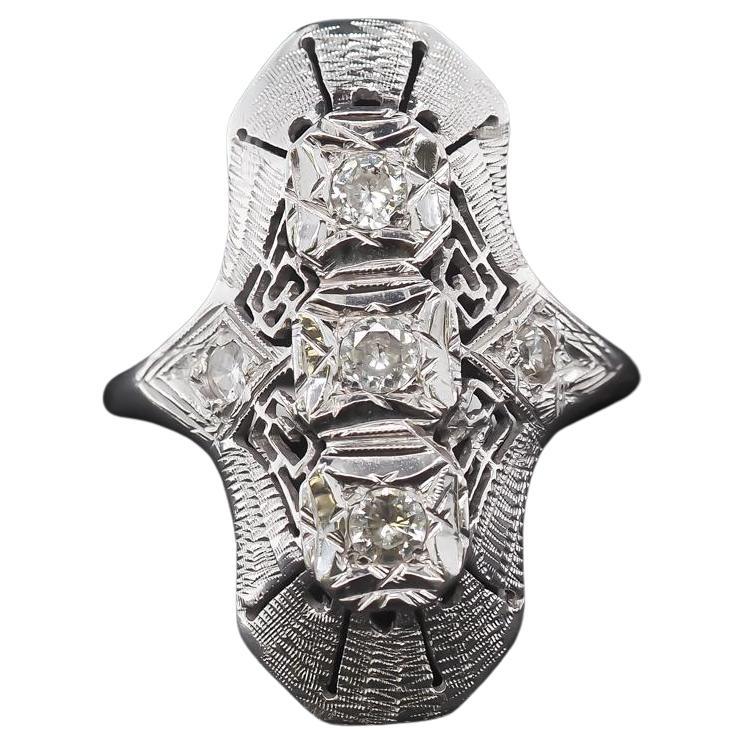 Circa 1960s 14K White Gold Diamond Shield Ring For Sale
