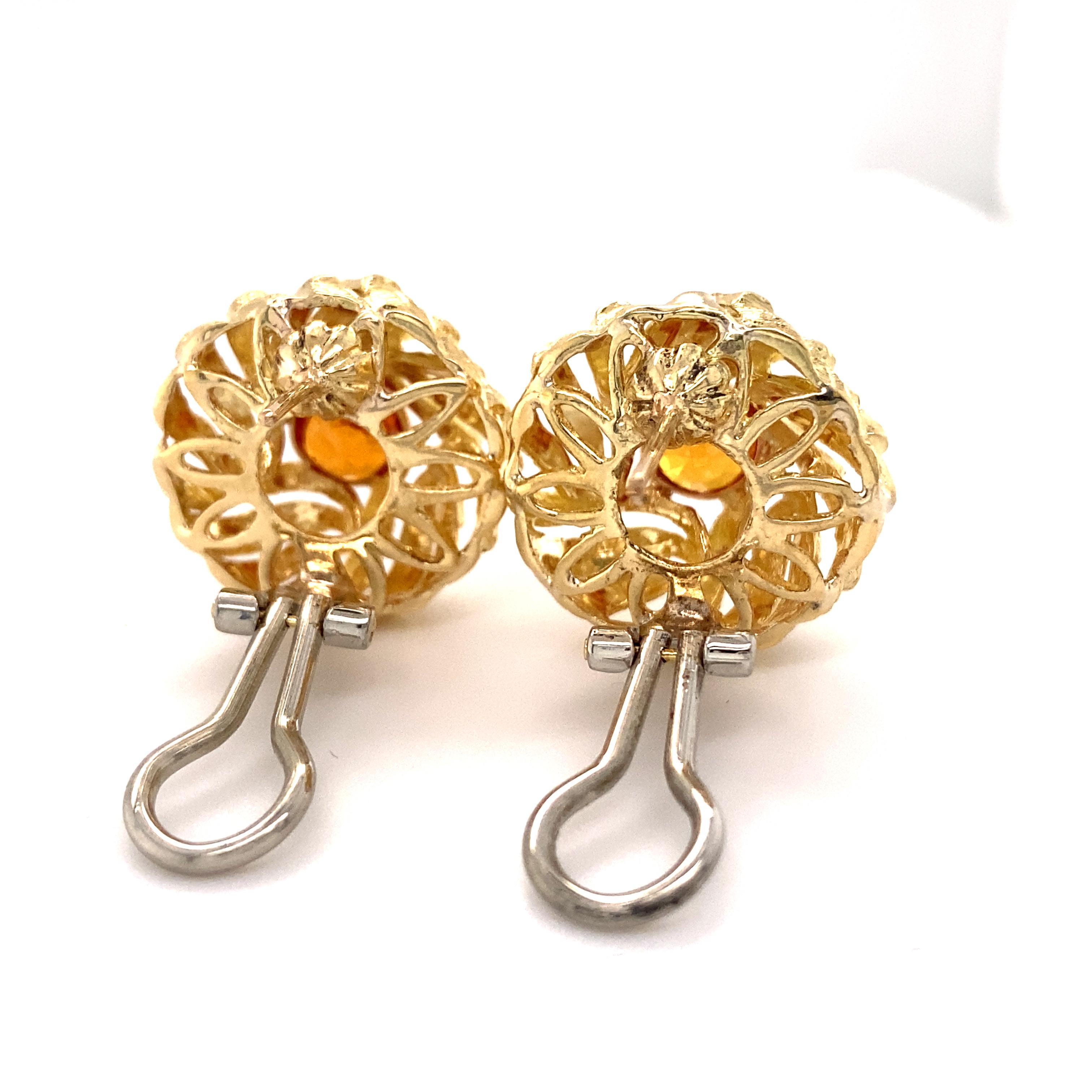 Boucles d'oreilles à levier en or 18 carats avec saphirs orange 