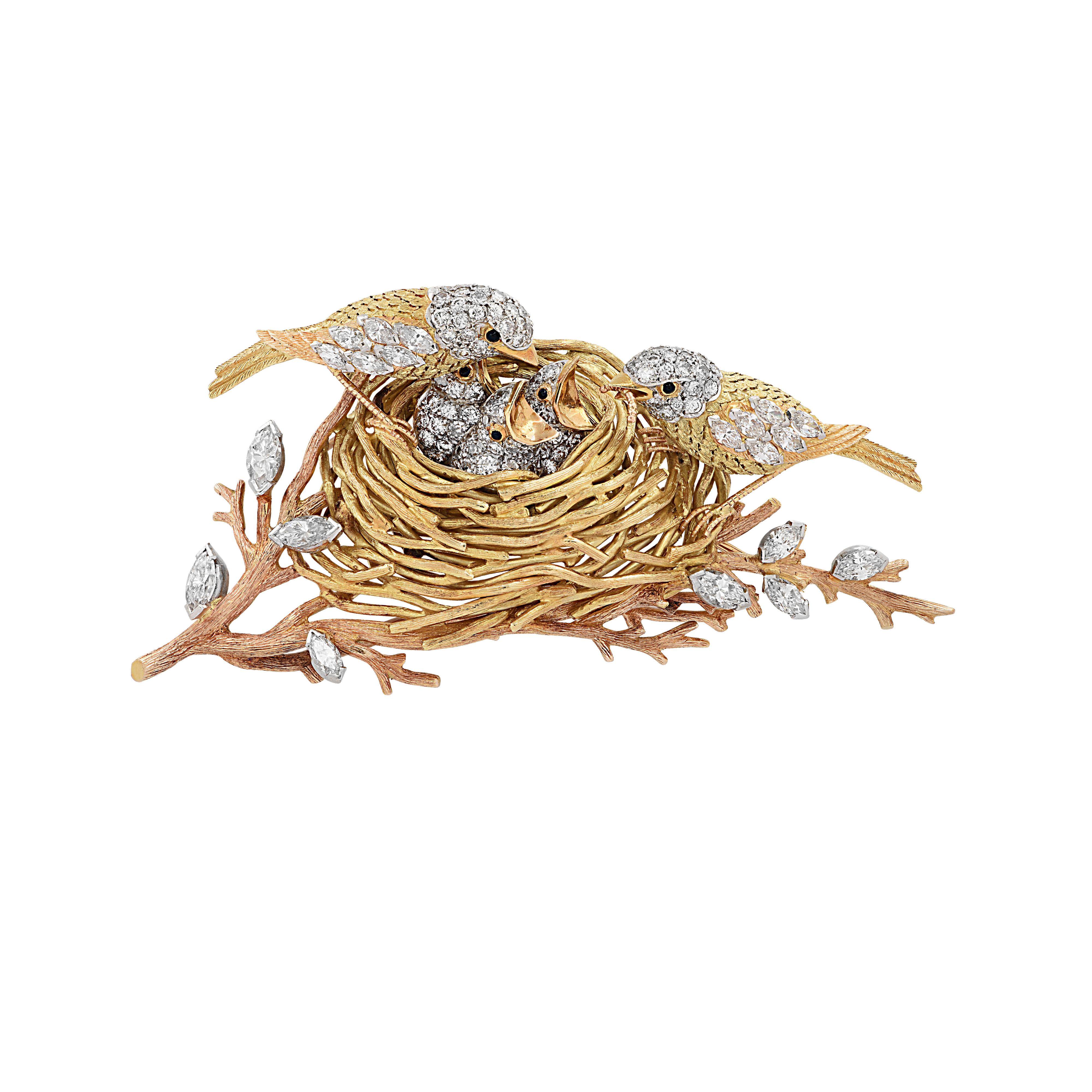 Enchanting Cartier brooch Pin crafted in 18 karat yellow gold and platinum, featuring 117 round brilliant cut and marquise cut diamonds weighing approximately 4.5 carats total, F color, VS clarity. This delightful brooch pin depicts a birds’ nest