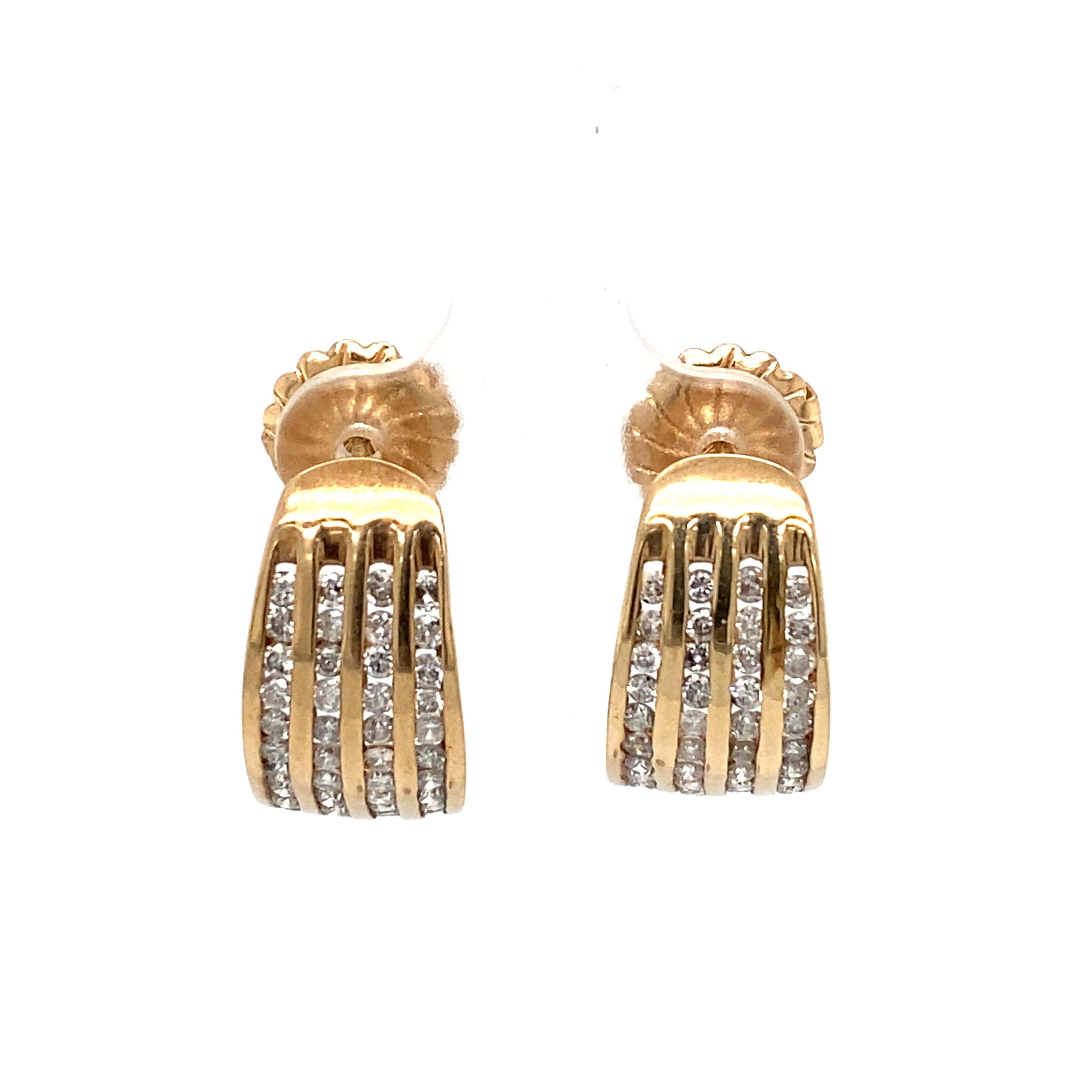 Item Details: These unique retro earrings have four rows of channel set diamonds in a gold setting.

Circa: 1960s
Metal Type: 10k gold
Weight: 5.5g
Size: 0.75