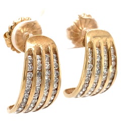 Vintage 1960s Curved Four Row Channel Set Diamond Earrings in 10 Karat Gold