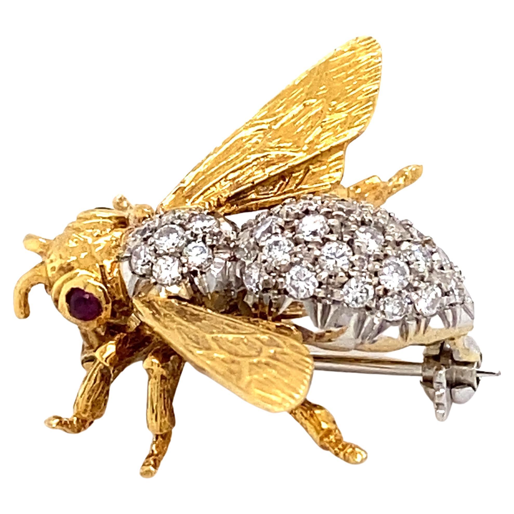 Circa 1960s Diamond and Ruby Bee Pin in 18 Karat Gold For Sale
