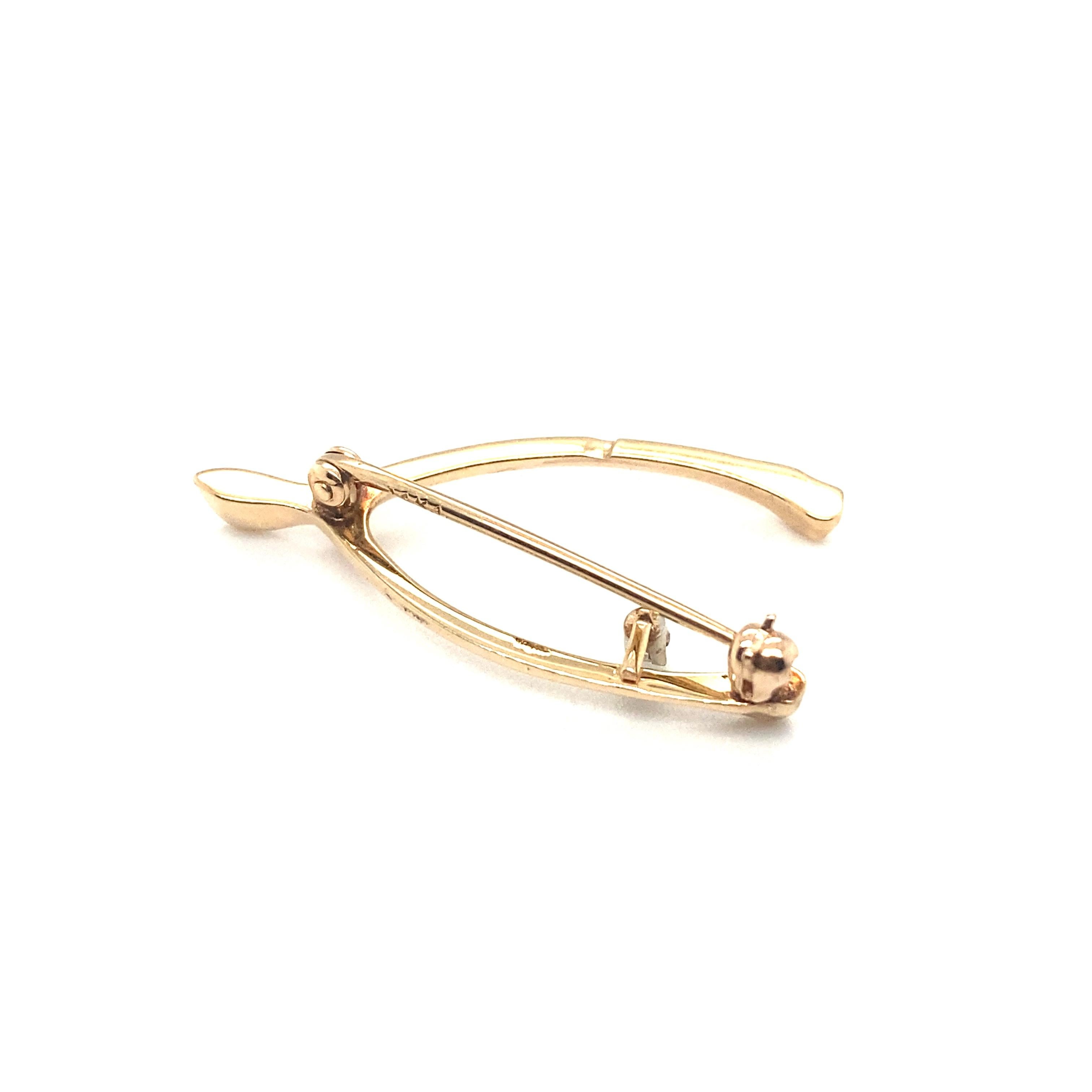 Circa 1960s Diamond Wishbone Lucky Charm Brooch in 14 Karat Gold In Excellent Condition For Sale In Atlanta, GA
