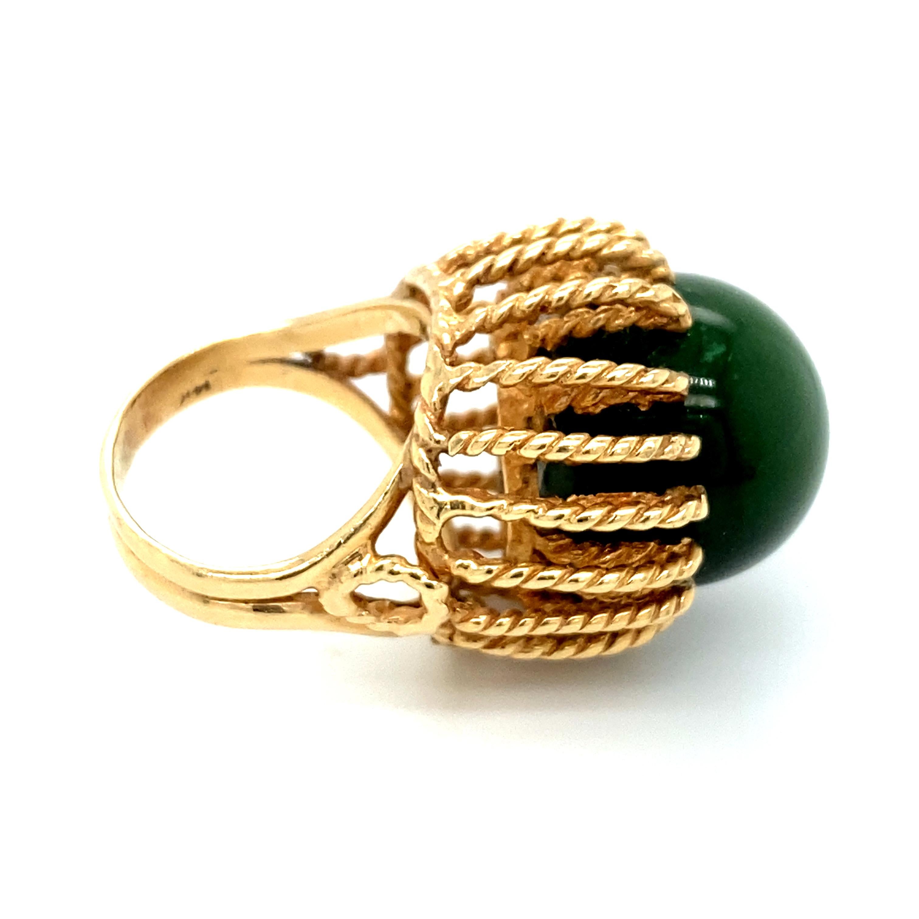 Circa 1960s Green Jade Cocktail Ring in 14 Karat Yellow Gold In Excellent Condition For Sale In Atlanta, GA