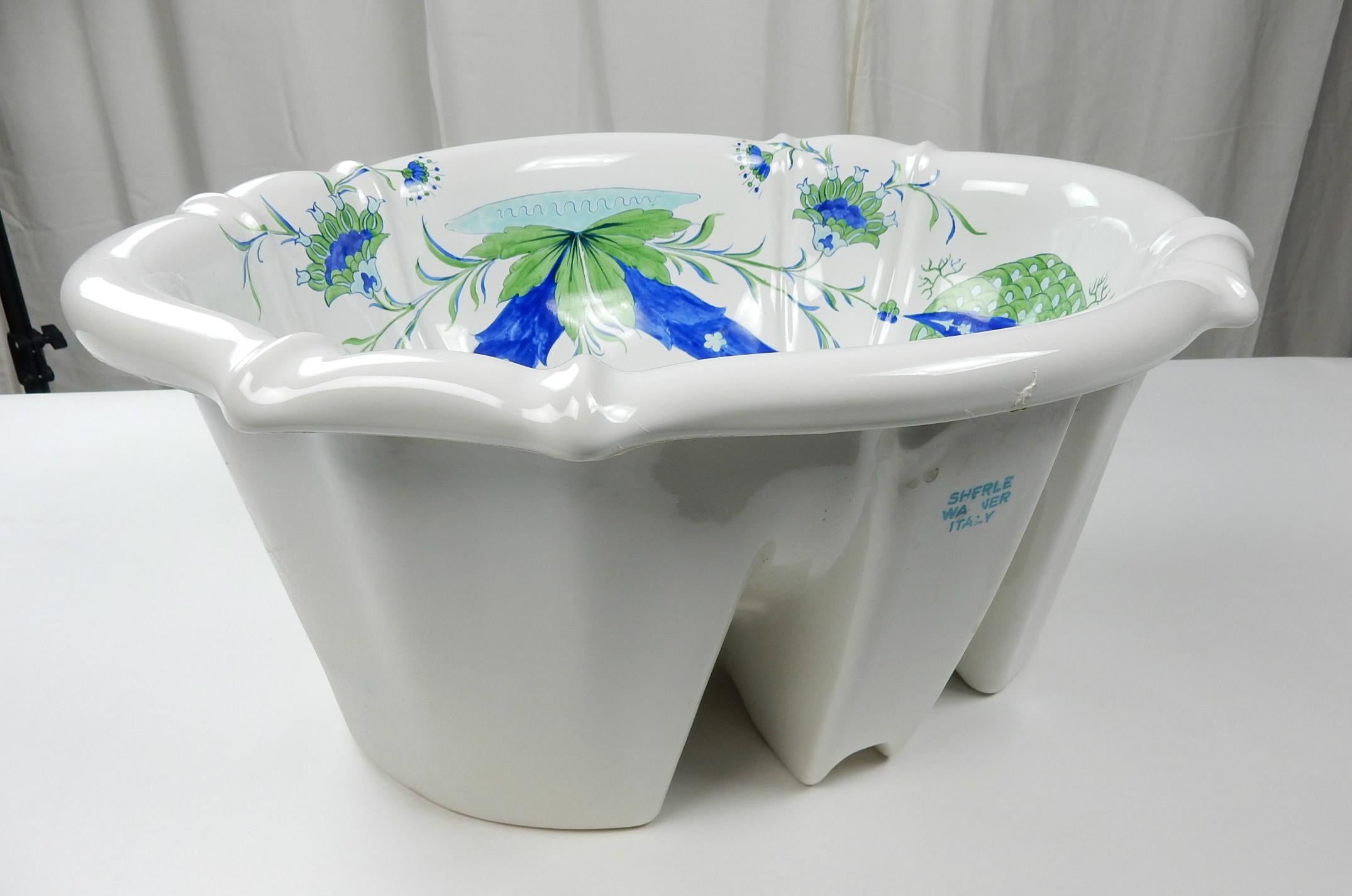 Gorgeous scalloped over edge basin/sink from the Sherle Wagner collection circa 1960s.
Porcelain hand painted design, glossy white.
 