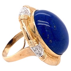 Circa 1960s Large Oval Lapis Ring with Diamonds in 14K Gold