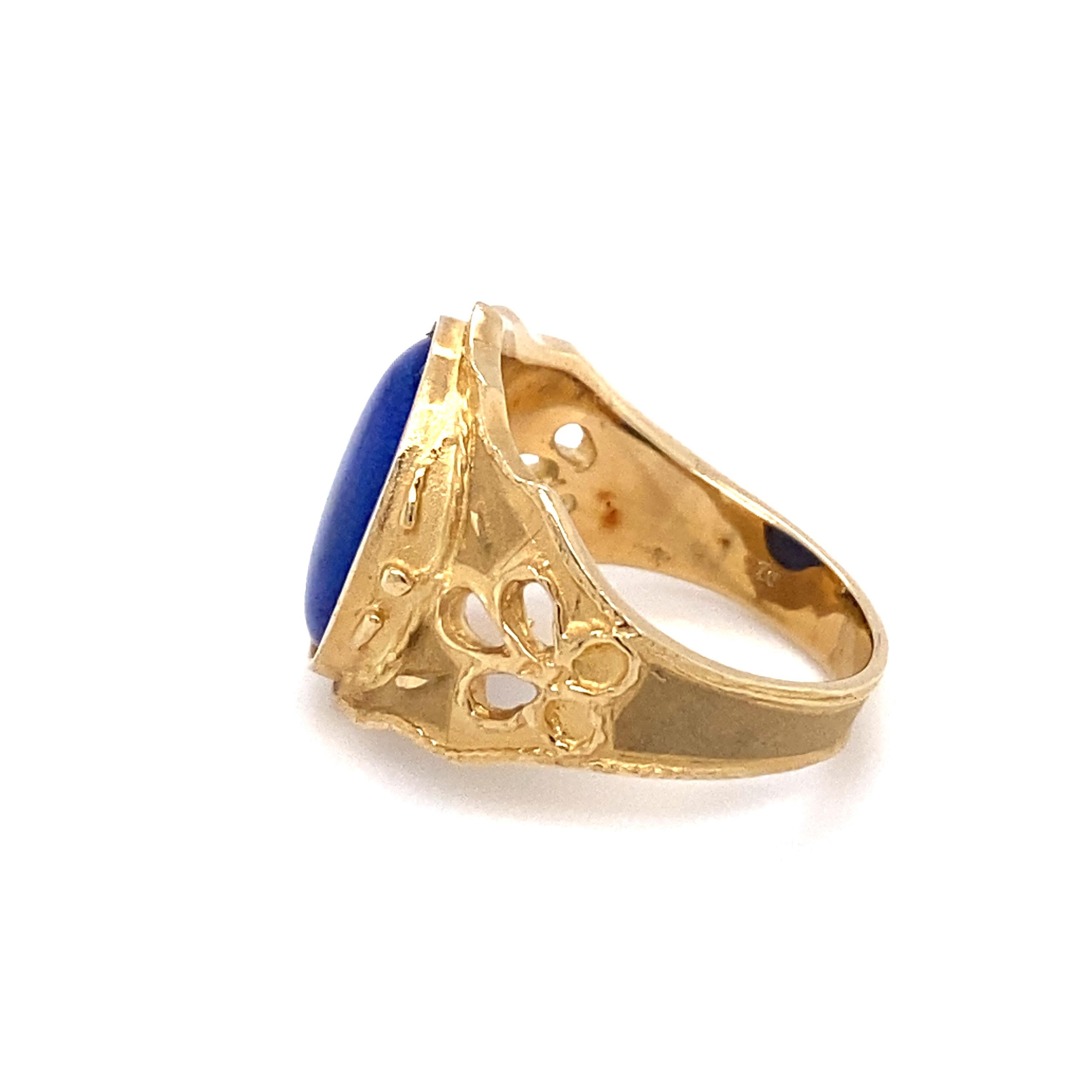 Art Deco circa 1960s Oval Lapis Lazuli Ring with Carved Floral Motif in 14K Gold