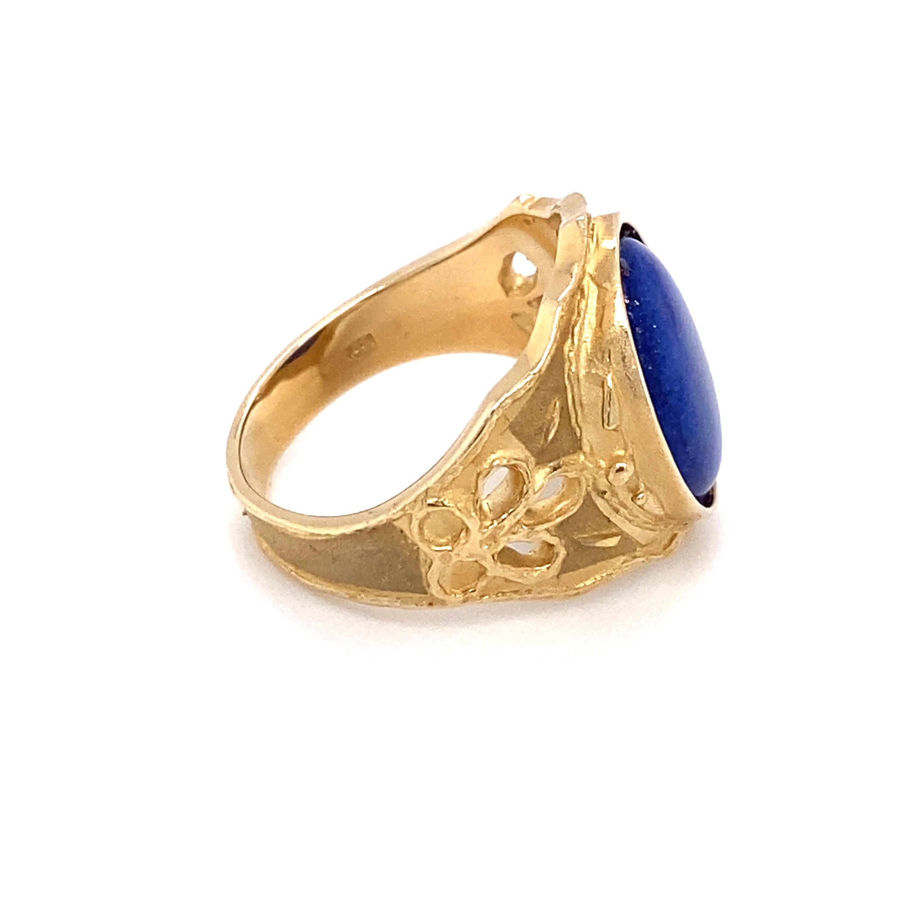 Oval Cut circa 1960s Oval Lapis Lazuli Ring with Carved Floral Motif in 14K Gold