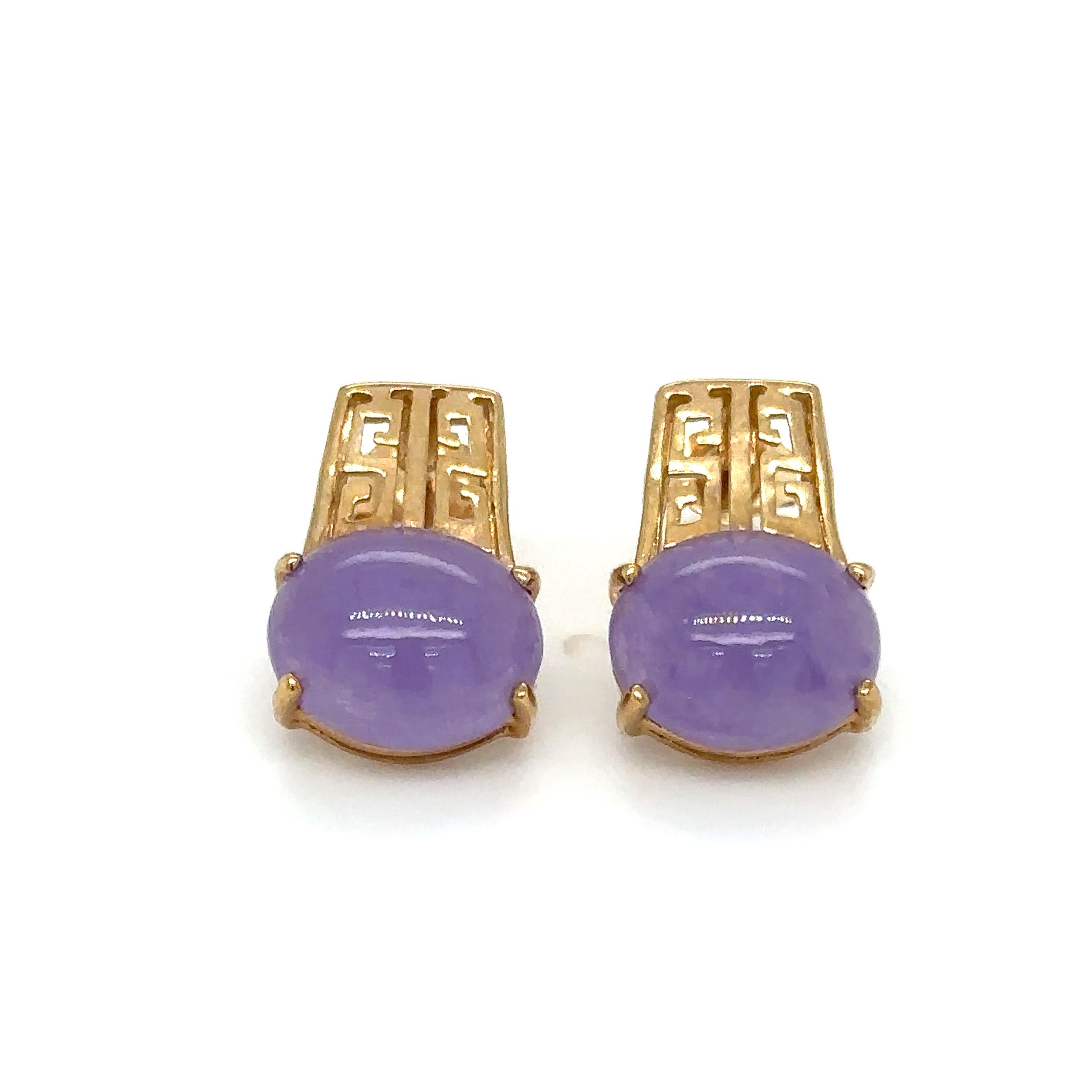 Item Details: These 14 Karat gold earrings with oval purple jade have a Greek key-style design. They have oval gemstones set horizontally with a geometric design above. These are beautiful retro earrings and are perfect for a lover of mid-century