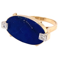 Circa 1960s Retro East-West Oval Lapis Lazuli and Diamond Ring in 14K Gold