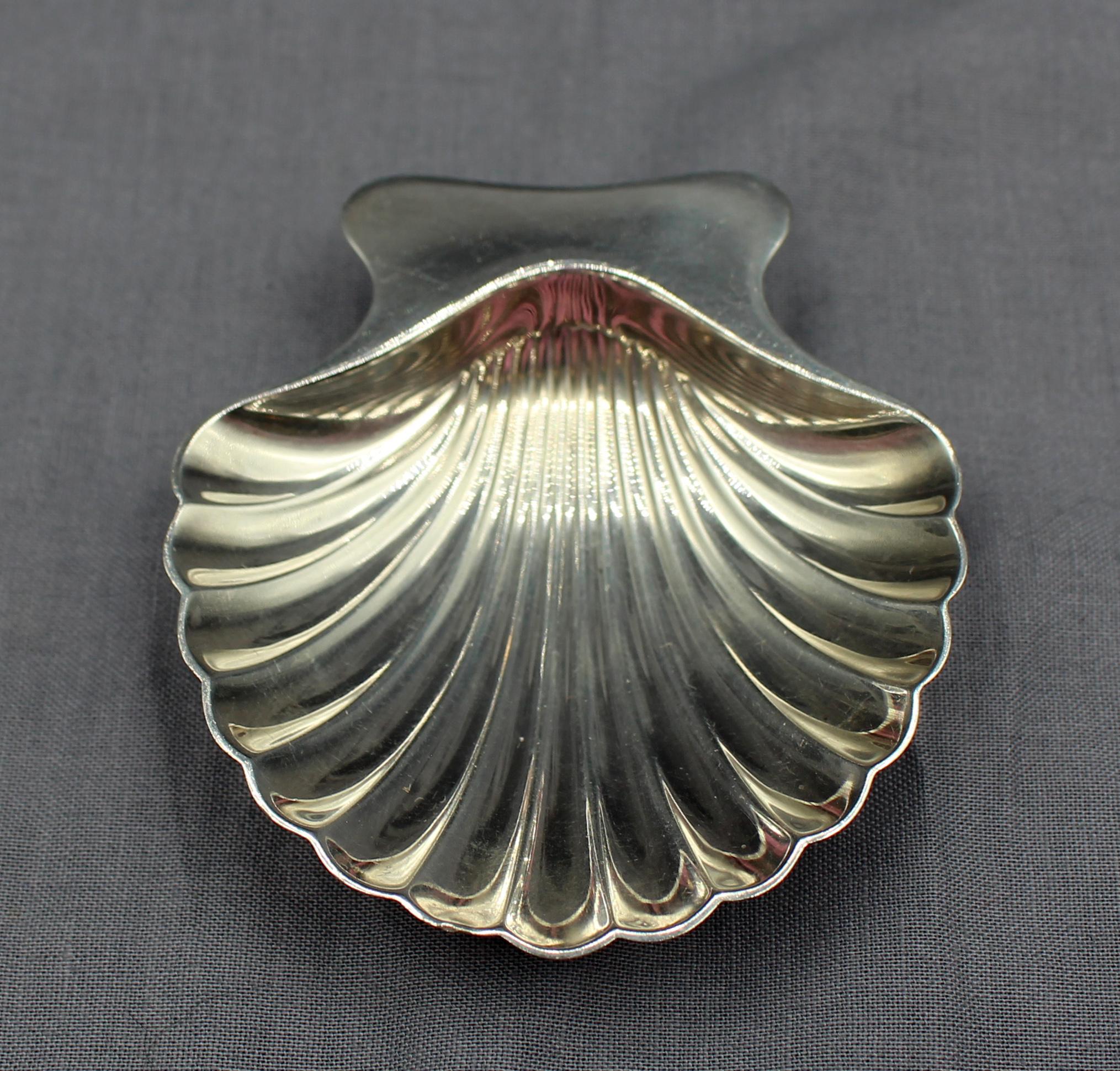 Circa 1960s set of 4 sterling scallop shell mint dishes, Tiffany. Raised on ball feet. 4.75 troy oz. Estate of Linda Kornberg.
2 7/8