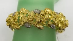 Circa 1960s Vintage 18 Karat Yellow Gold Diamond Acorn and Leaf Bracelet