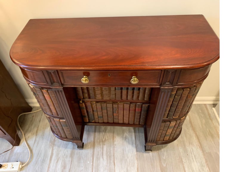 Mahogany OneDrawer and Center Door Desk Made with Antique Books, circa