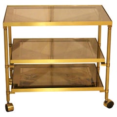 CIRCA 1970 Chariot en laiton et verre de style moderne du milieu du siècle dernier