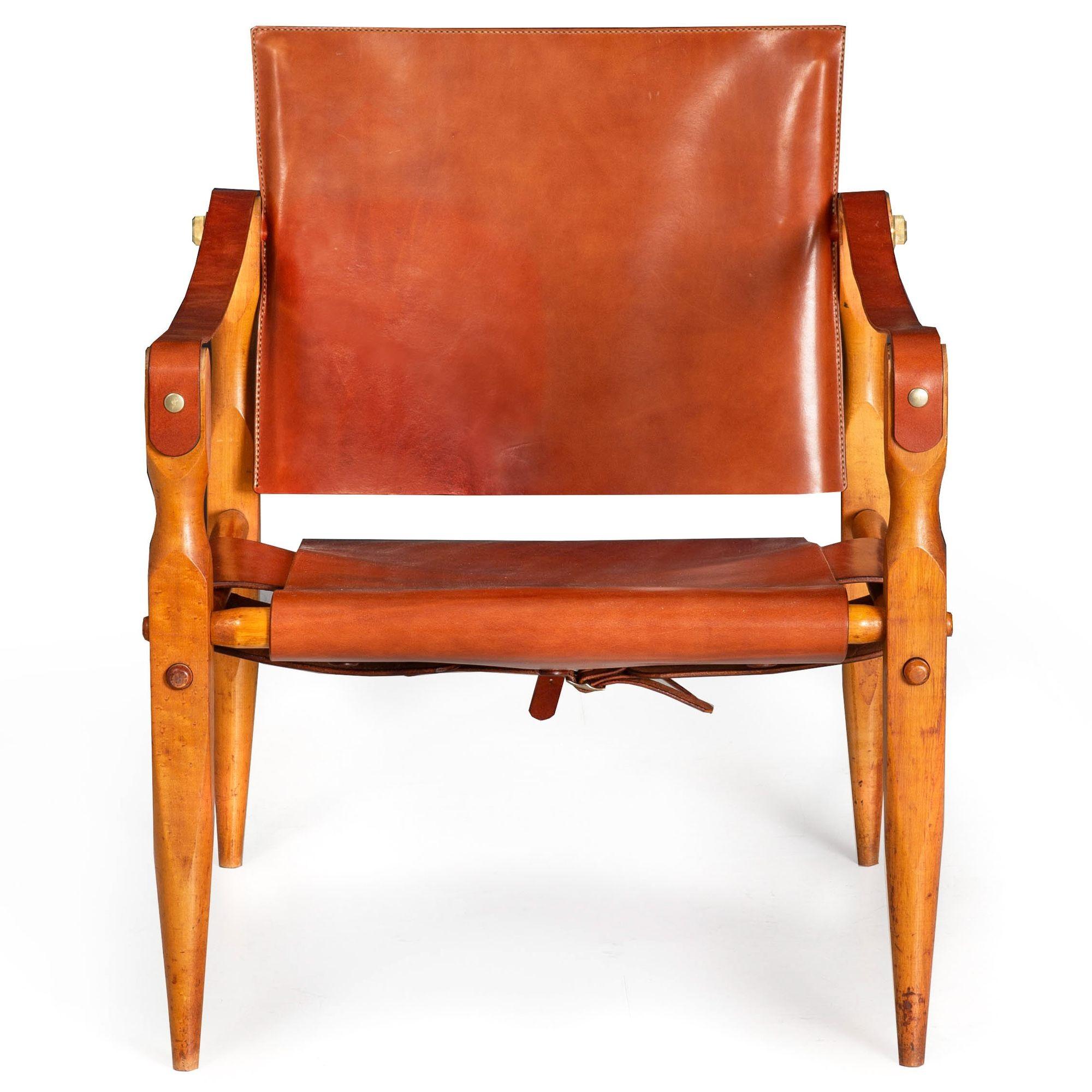 SCANDINAVIAN MODERN MAPLE & LEATHER SAFARI CHAIRS ATTRIBUTED TO WILHELM KIENZLE
Circa 1970  unmarked  brand new expertly crafted leather and custom machined hardware  a pair to this chair may still remain available
Item # 306YRC27L-1

An absolutely