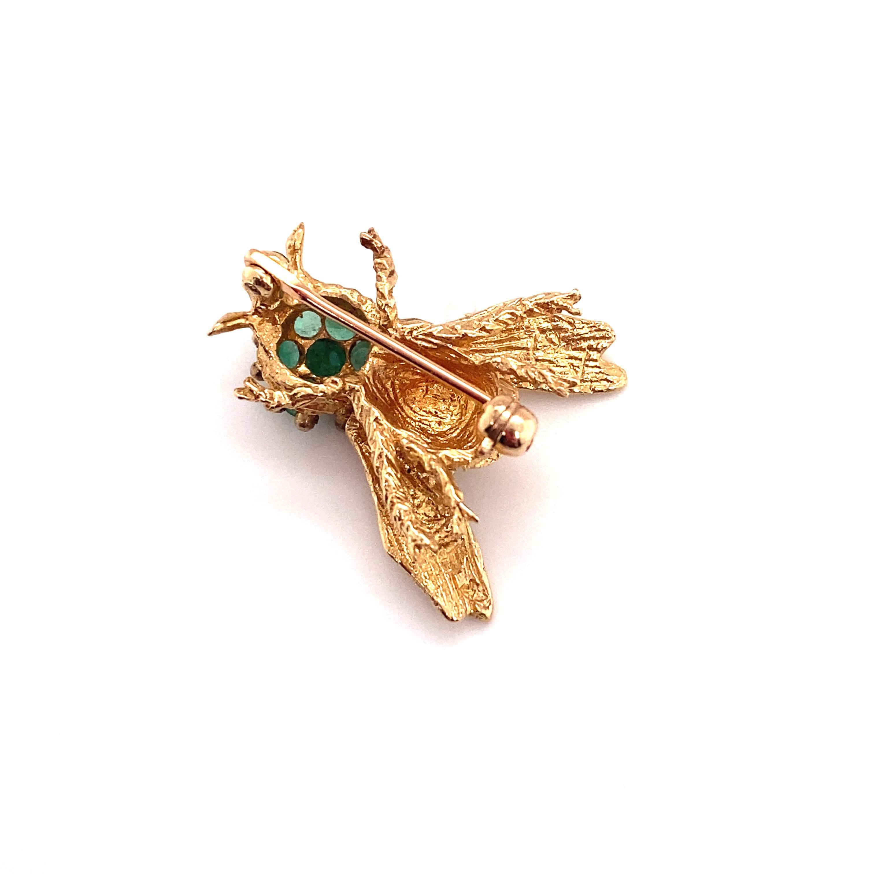 Circa: 1970s
Metal Type: 14 karat yellow gold
Weight: 4.0 grams
Dimensions: 1 inch x 1 inch 

Emerald Details:

Carat: 0.50 carat total weight
Shape: Round
Color: Forest green
