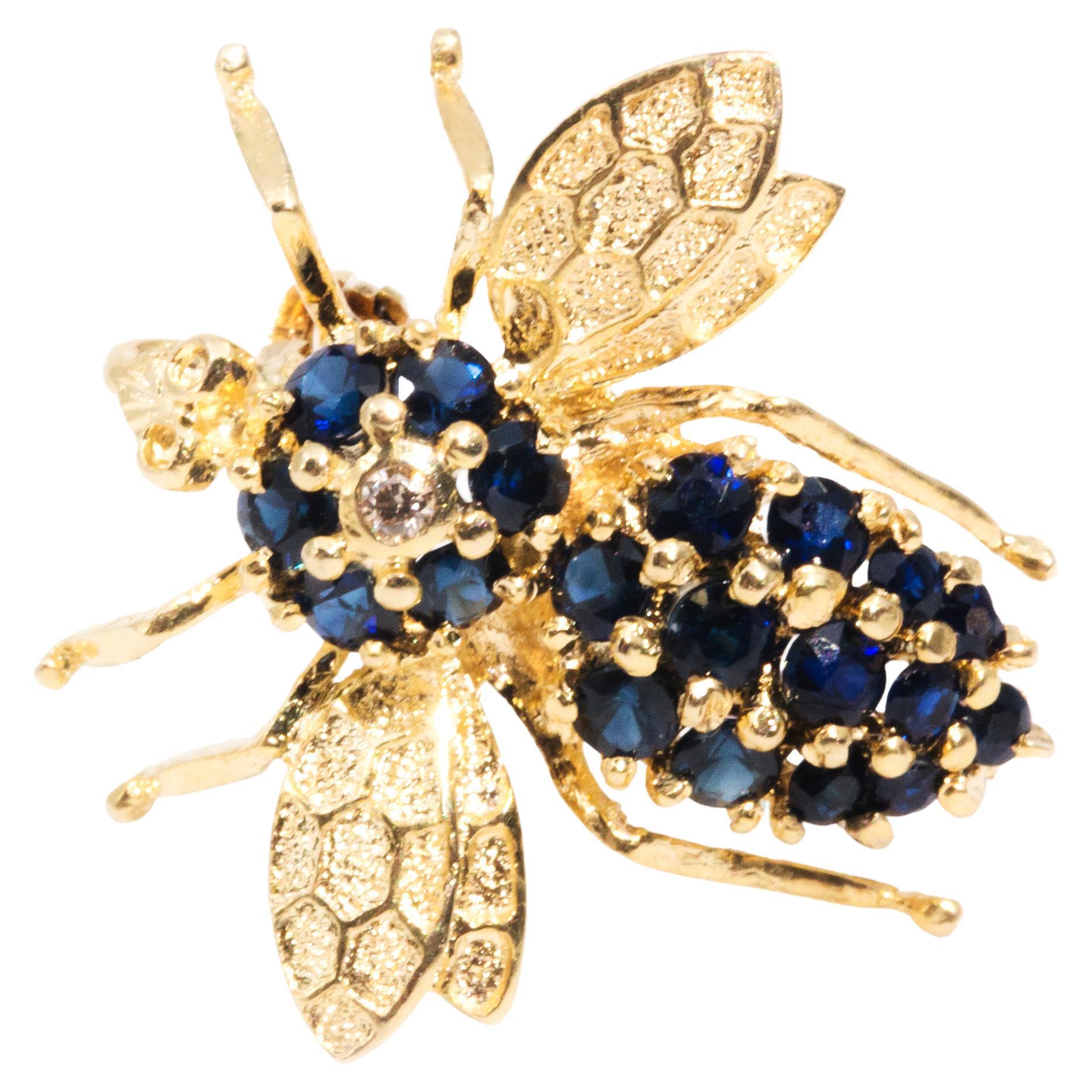 Circa 1970s, 14 Carat Yellow Gold Diamond and Sapphire Vintage Bee Brooch