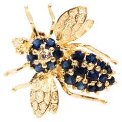 Circa 1970s, 14 Carat Yellow Gold Diamond and Sapphire Vintage Bee Brooch