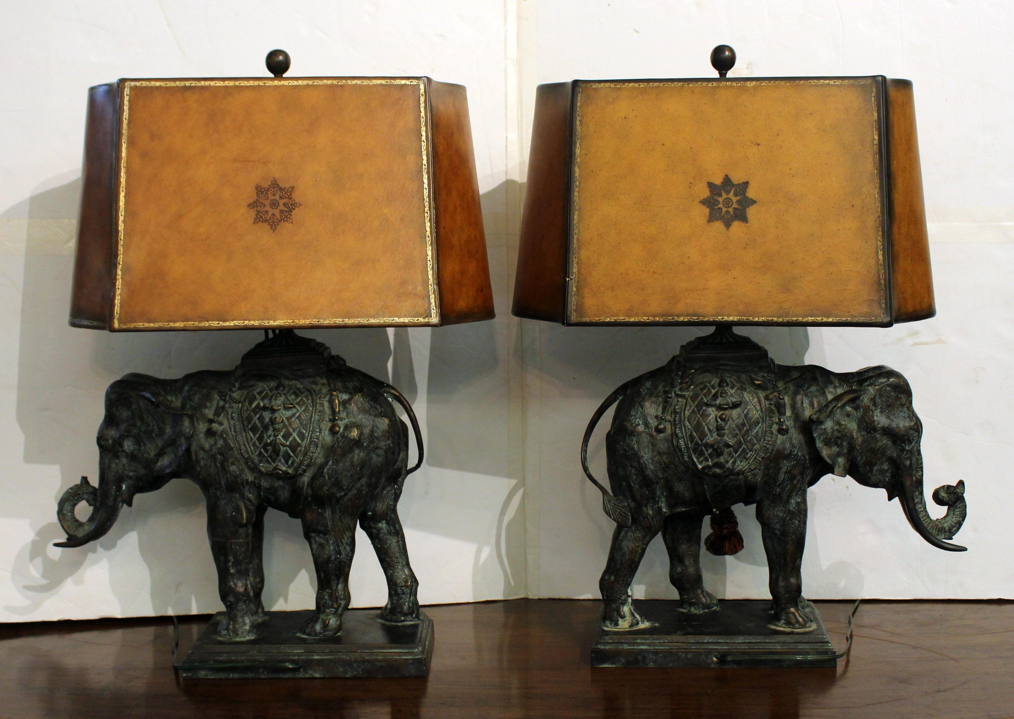 Circa 1970s pair of bronze elephant lamps by Maitland Smith, American. Original leather shades. Beautifully cast & patinated bronze - typical of the premium work of Maitland Smith. Very good condition. 27