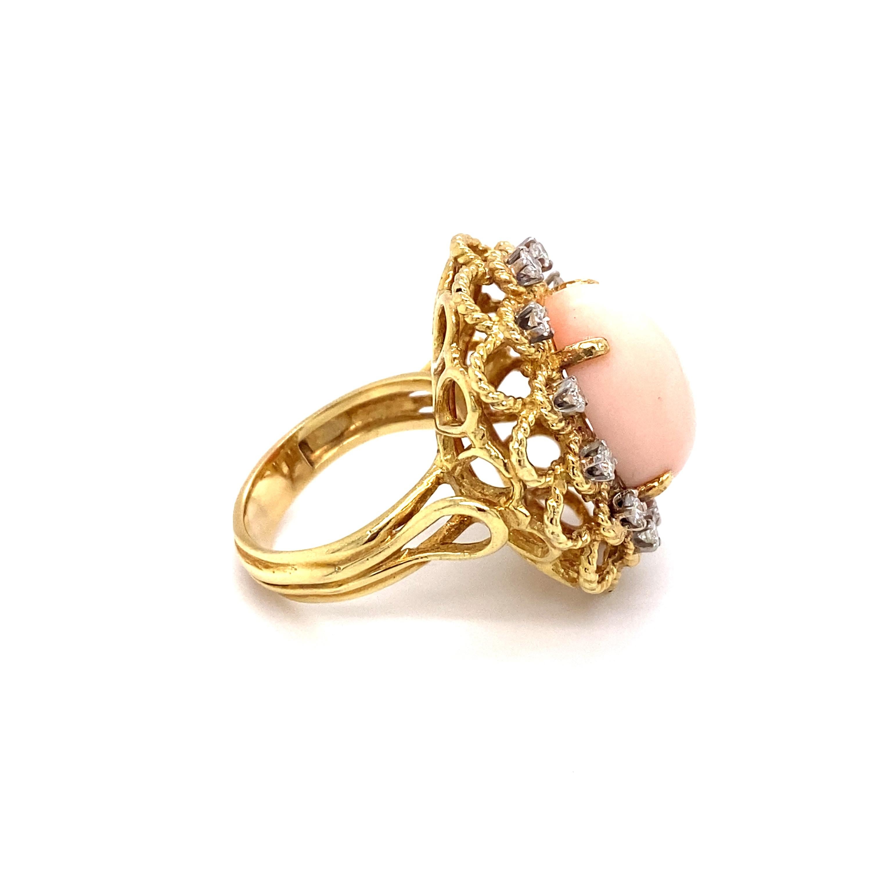 Art Deco Circa 1970s Angel Skin Coral and Diamond Cocktail Ring in 18K Gold For Sale