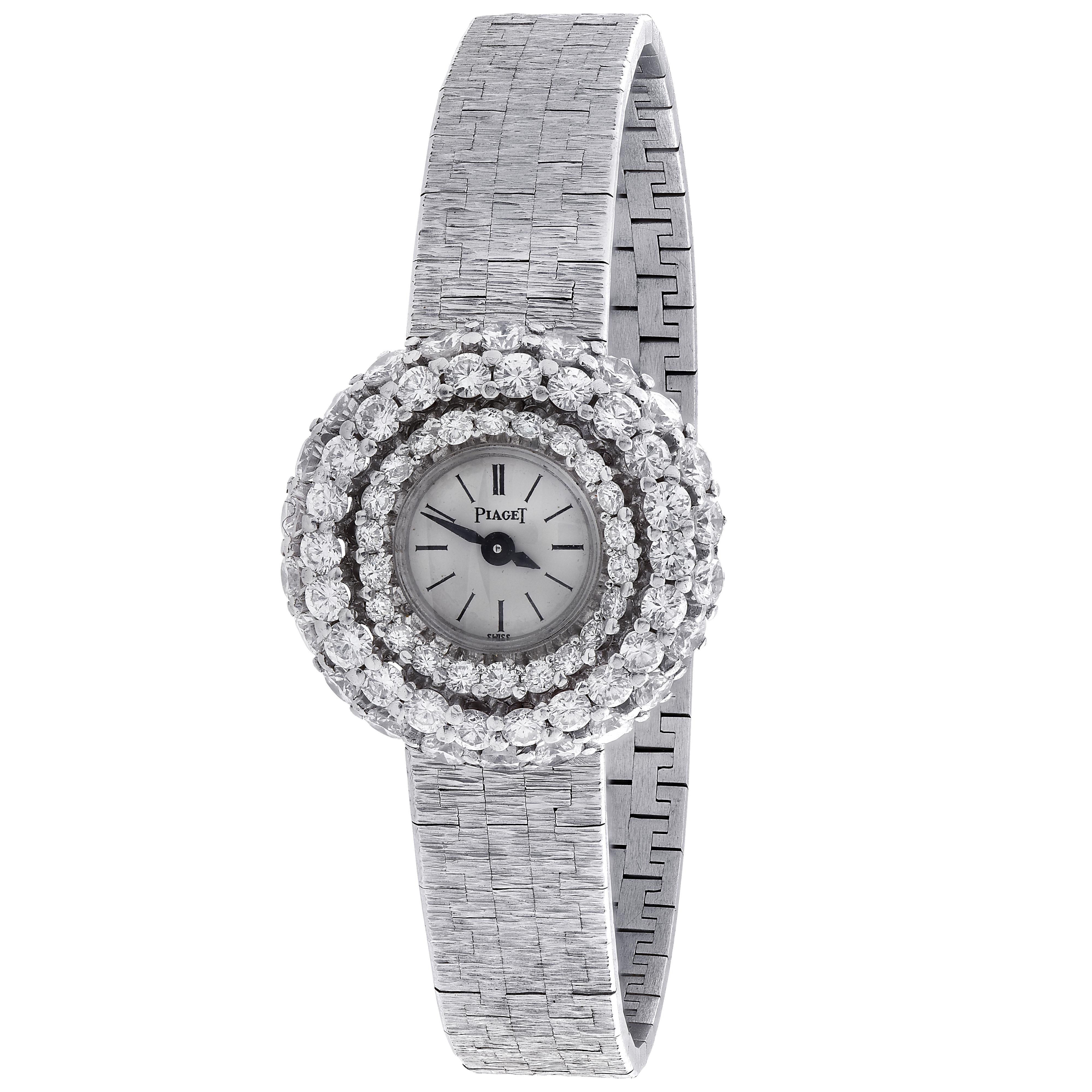 Ladies Piaget watch, Circa 1970, featuring 21 round brilliant cut diamonds weighing approximately 1.70 carats total, 22 round brilliant cut diamonds weighing approximately 1.10 carats total and 23 round brilliant cut diamonds weighing approximately