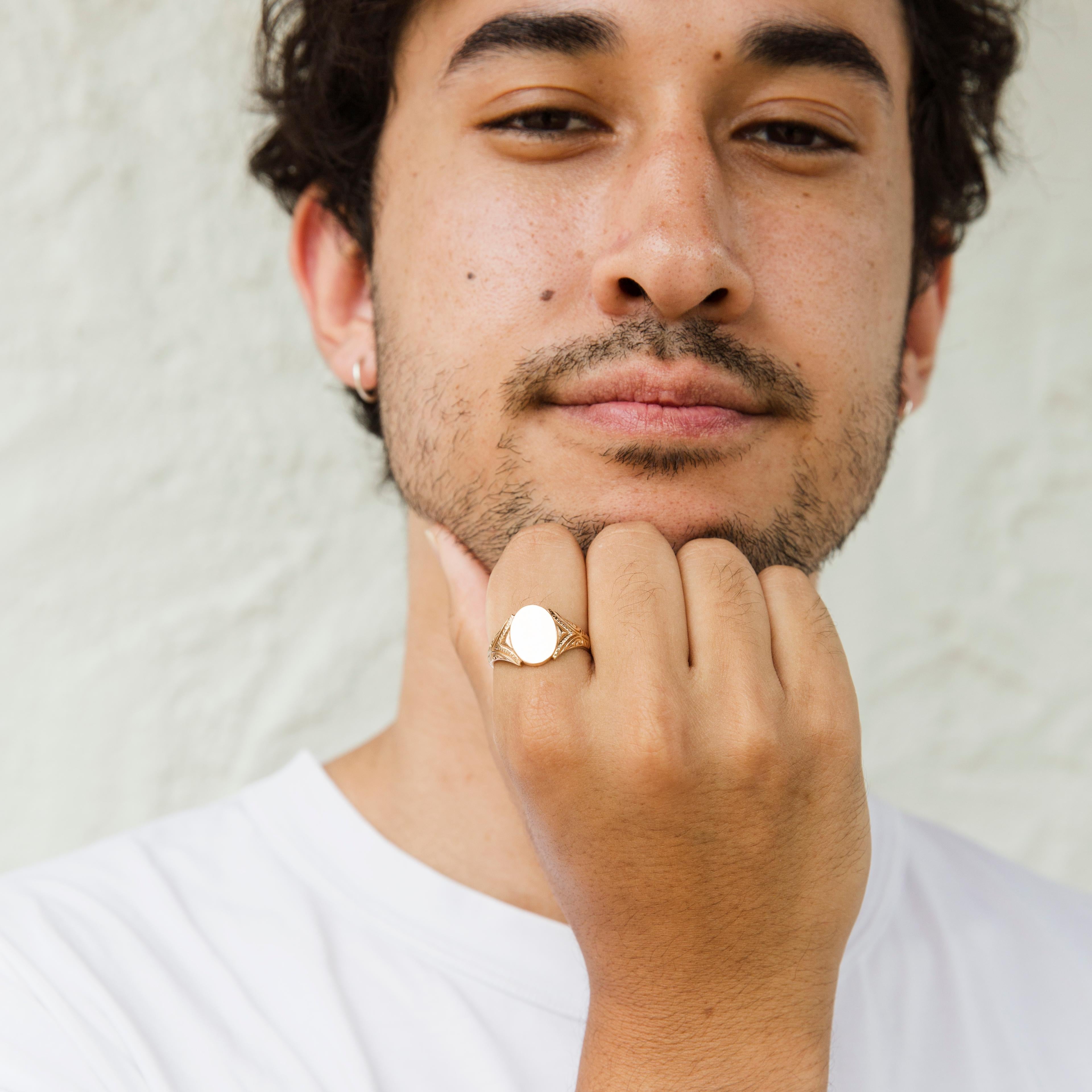 Modern Circa 1970s Men's Oval Shaped Vintage Floral Signet Ring in 9 Carat Yellow Gold