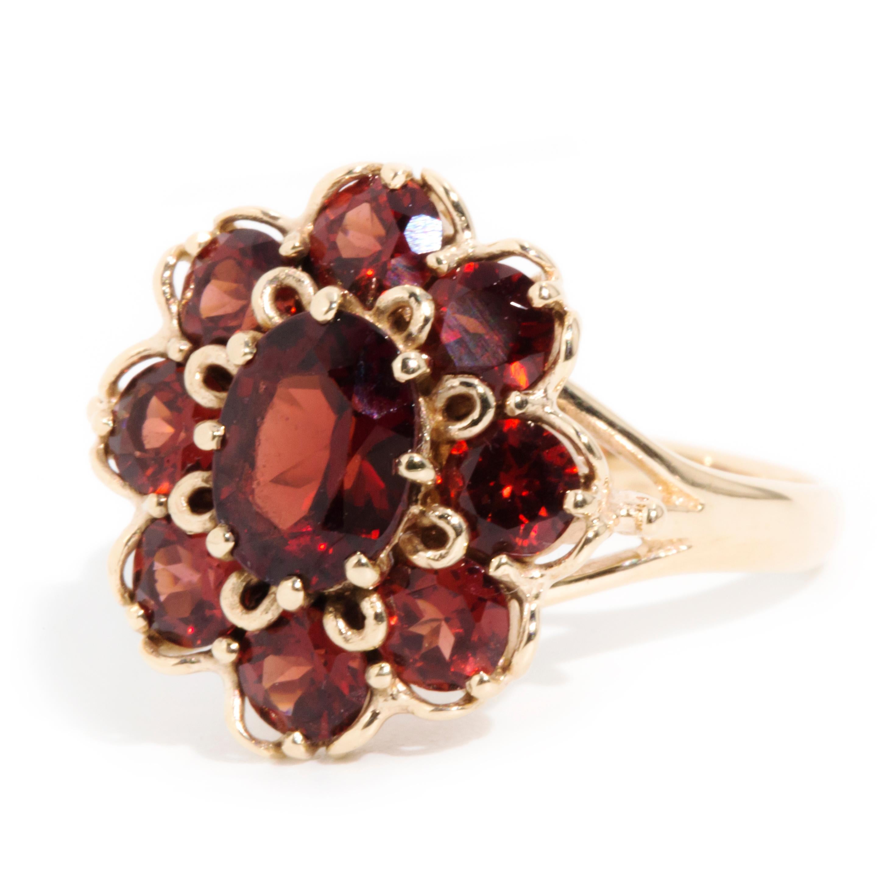 Modern Circa 1970s Red Oval Garnet Vintage Halo Cluster Ring in 9 Carat Yellow Gold