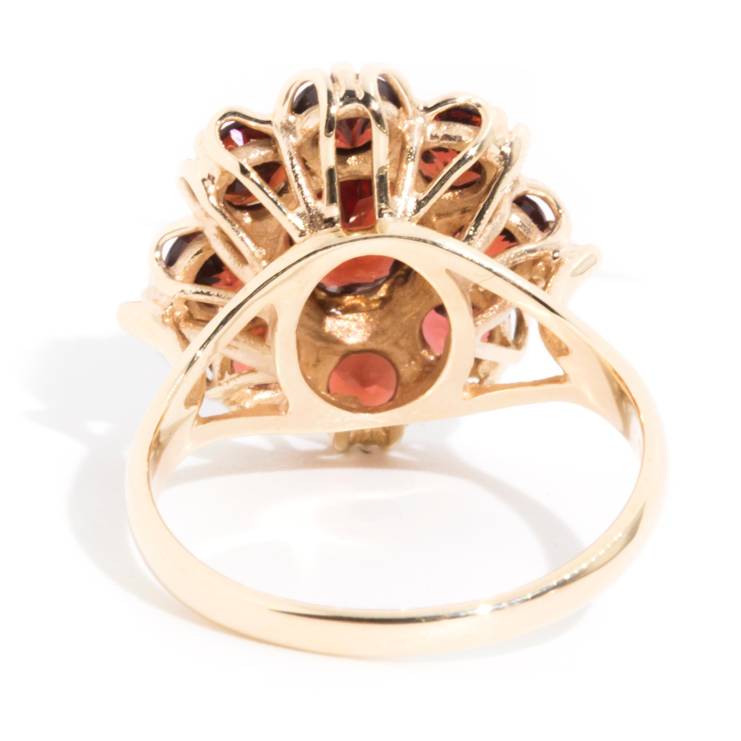 Circa 1970s Red Oval Garnet Vintage Halo Cluster Ring in 9 Carat Yellow Gold 3