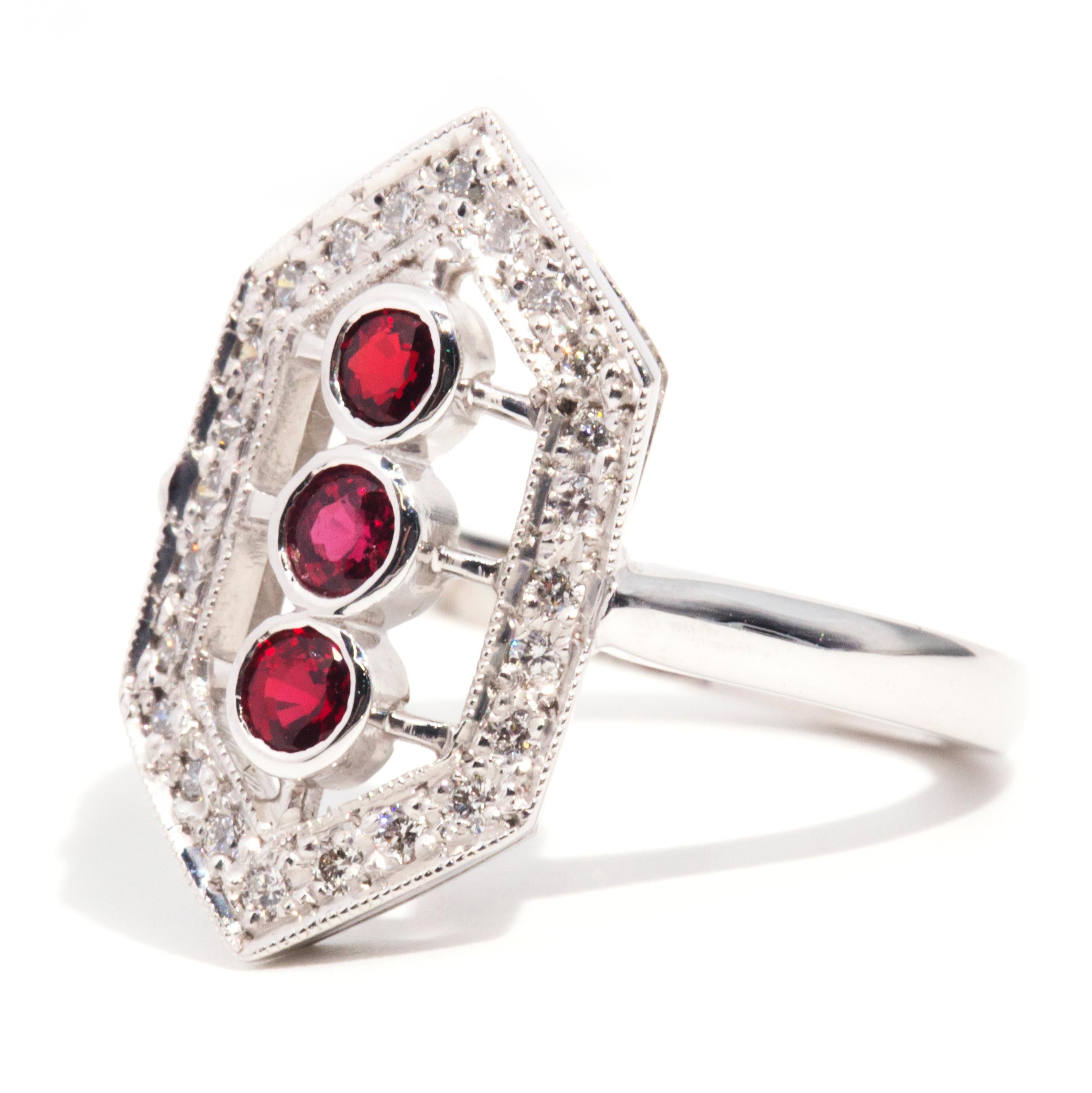 Circa 1970s, Red Ruby and Brilliant Diamond Cluster Ring 18 Carat White Gold For Sale 1