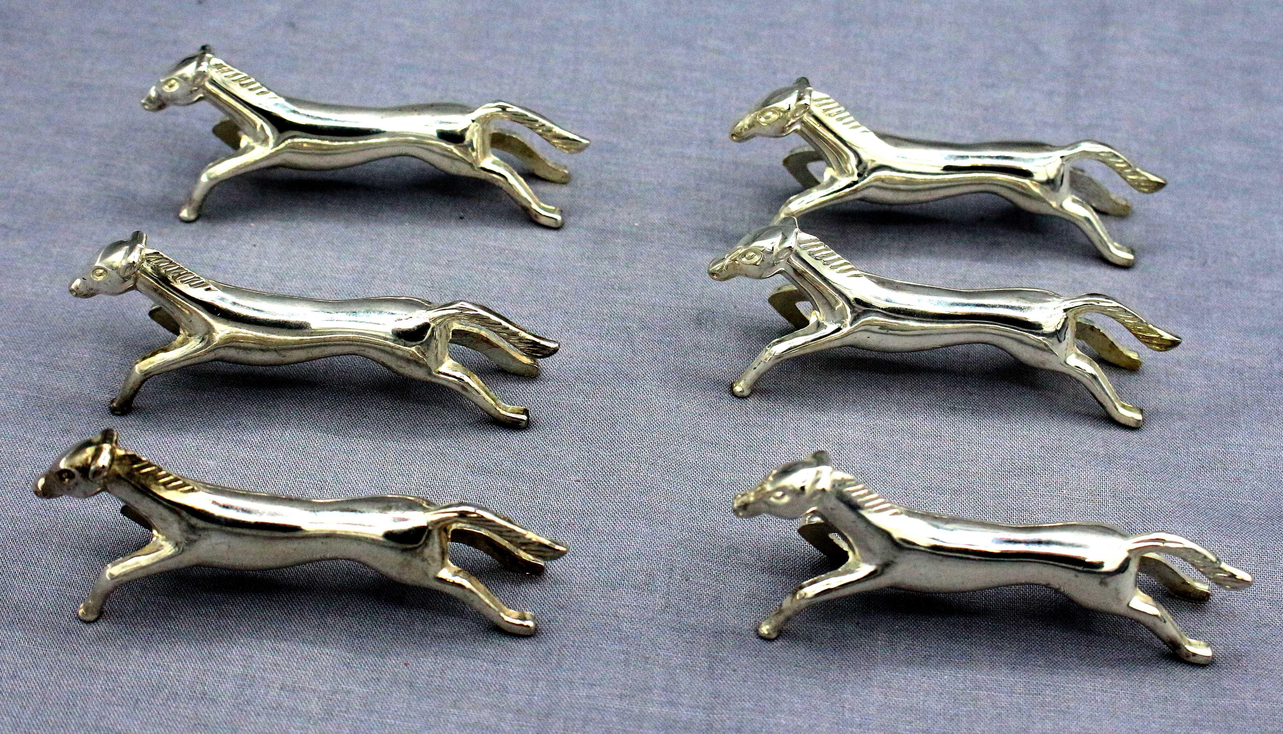 Circa 1970s set of 6 running horse knife rests, probably French. Silver plated. Art deco design. Well modelled.
3