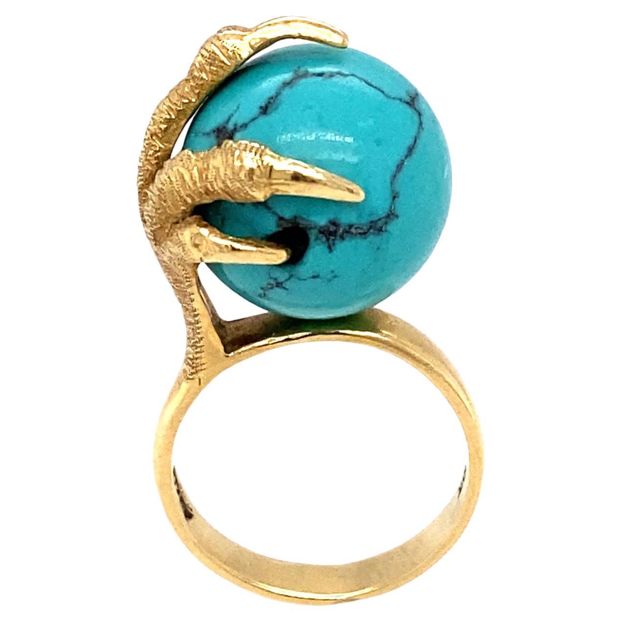 Circa 1970s Turquoise Bead and Claw Ring in 18 Karat Gold  For Sale