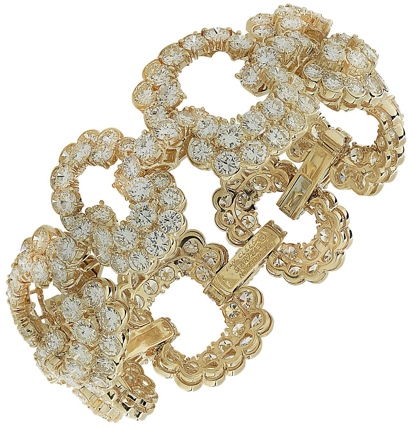 Exquisite 1970’s Van Cleef & Arpels classic high jewelry, diamond bracelet, finely crafted in 18 karat yellow gold, featuring 240 round brilliant cut diamonds weighing 40 carats total, D-F color, VS clarity. The diamonds are fashioned into a