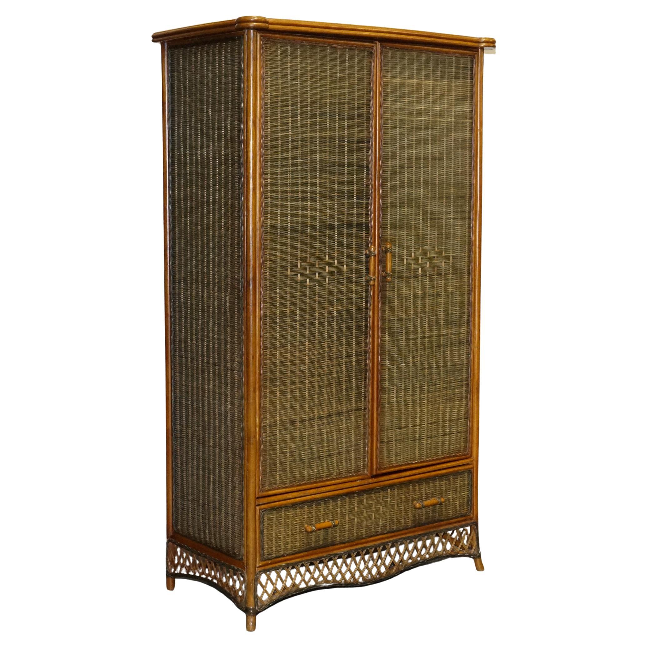CIRCA 1970
S WOVEN WICKER ARMOIRE WARDROBE WiTH ONE DRAWER (1/2)