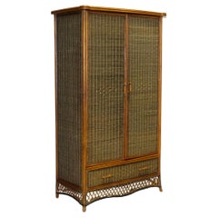 CIRCA 1970
S WOVEN WICKER ARMOIRE WARDROBE WiTH ONE DRAWER (1/2) CIRCA 1970
S WOVEN WICKER ARMOIRE WARDROBE WiTH ONE DRAWER (1/2)