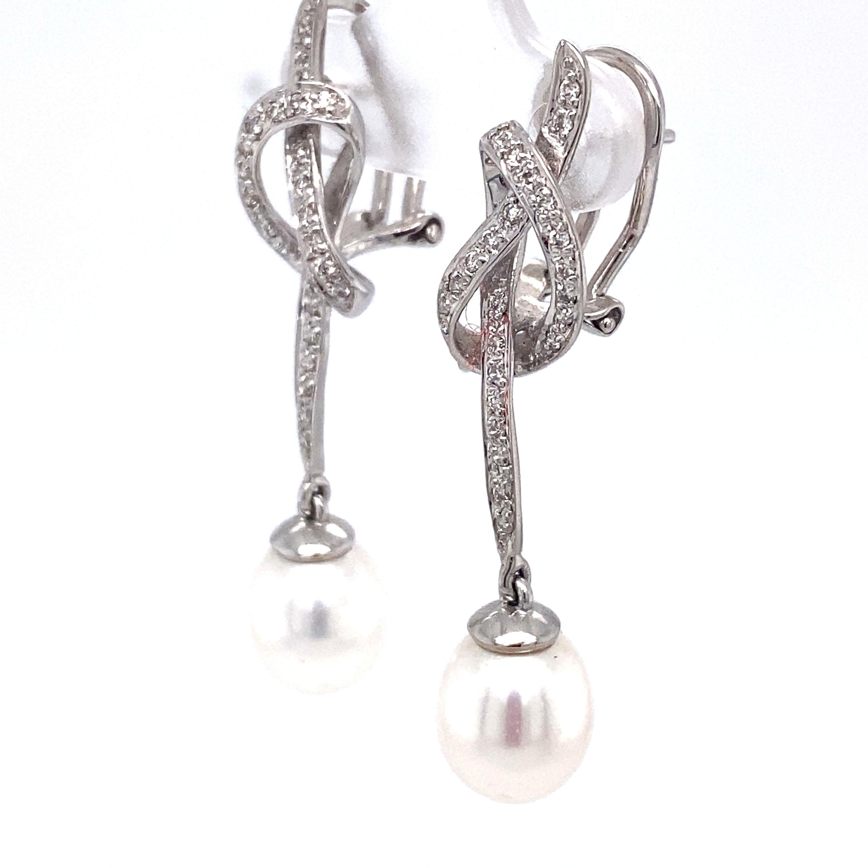 Women's Circa 1980s 0.75 Carat Diamond and Pearl Knot Dangle Earrings in 18K White Gold