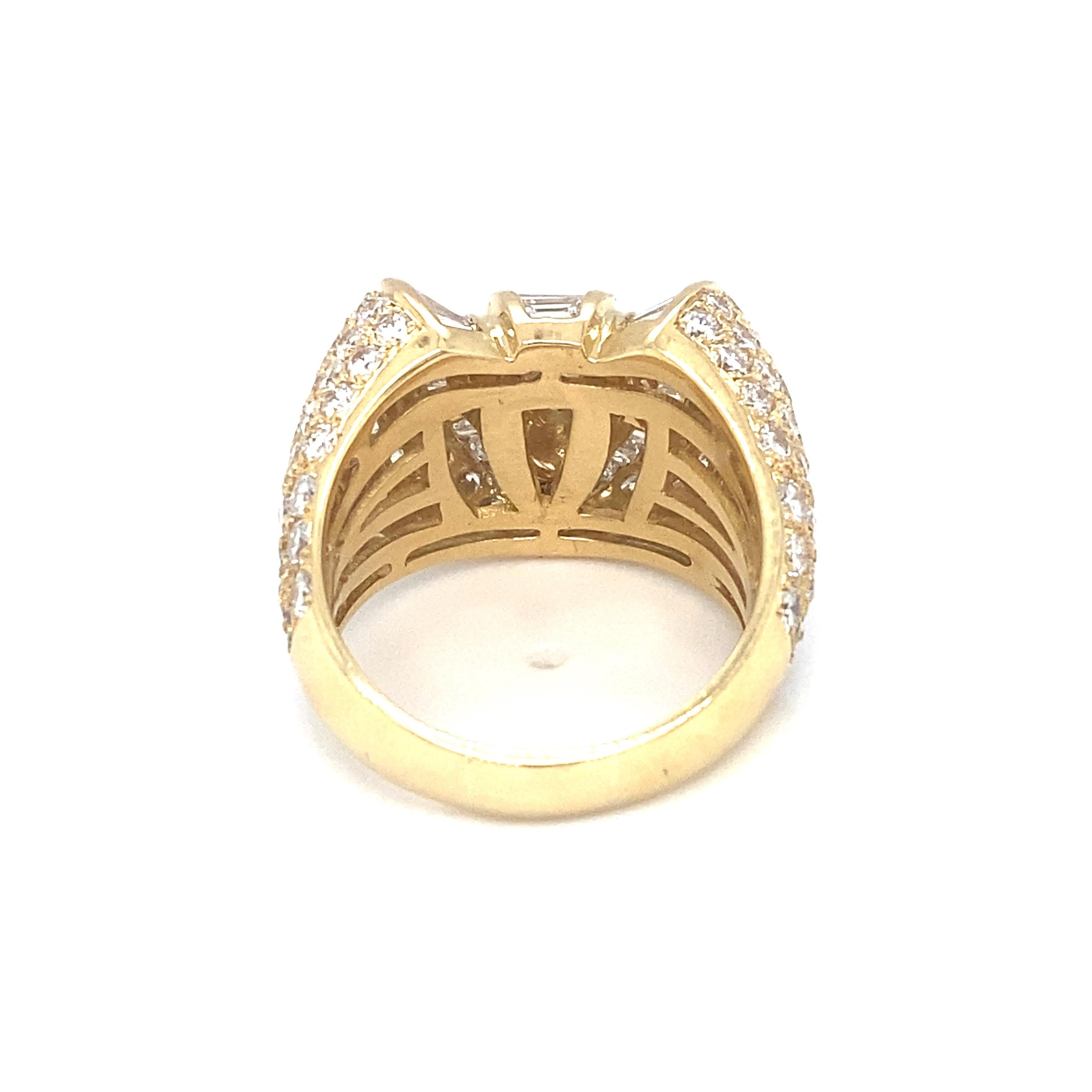 Item Details: This large ring features baguette and round diamonds and is an excellent statement piece!

Circa: 1980s
Metal Type: 18k yellow gold
Weight: 16.3g
Size: US 9, resizable

Diamond Details:

Carat: 7.0 carat total weight
Shape: Round and
