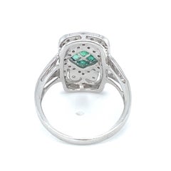 Circa 1980s Art Deco Style Emerald and Diamond Ring in 14K White Gold