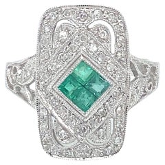Circa 1980s Art Deco Style Emerald and Diamond Ring in 14K White Gold