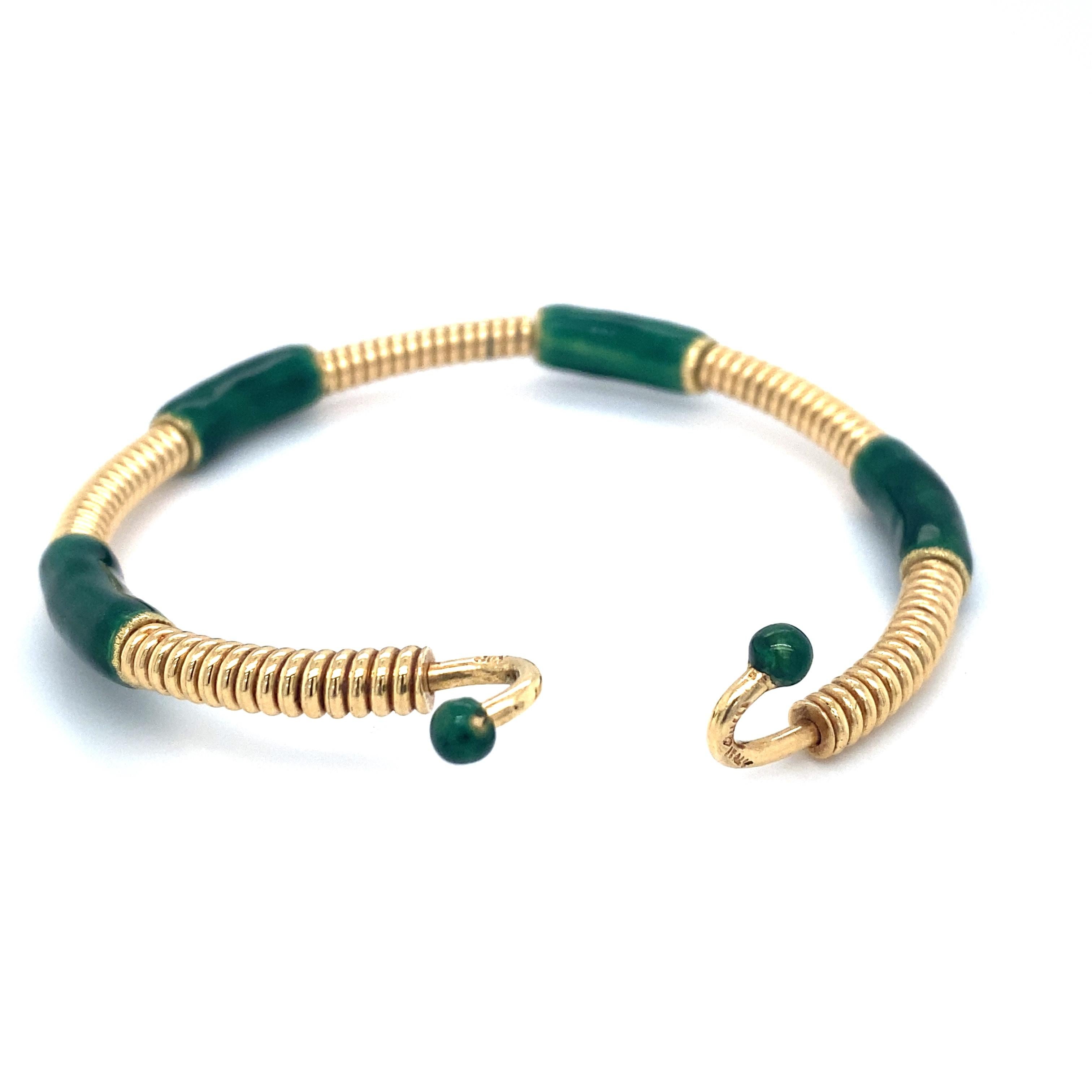 Circa 1980s GUCCI Green Enamel Coil Bracelet in 18 Karat Gold In Excellent Condition In Hicksville, NY