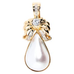 Circa 1980s Mabe Pearl and Diamond Vintage  18 Carat Gold Enhancer Pendant