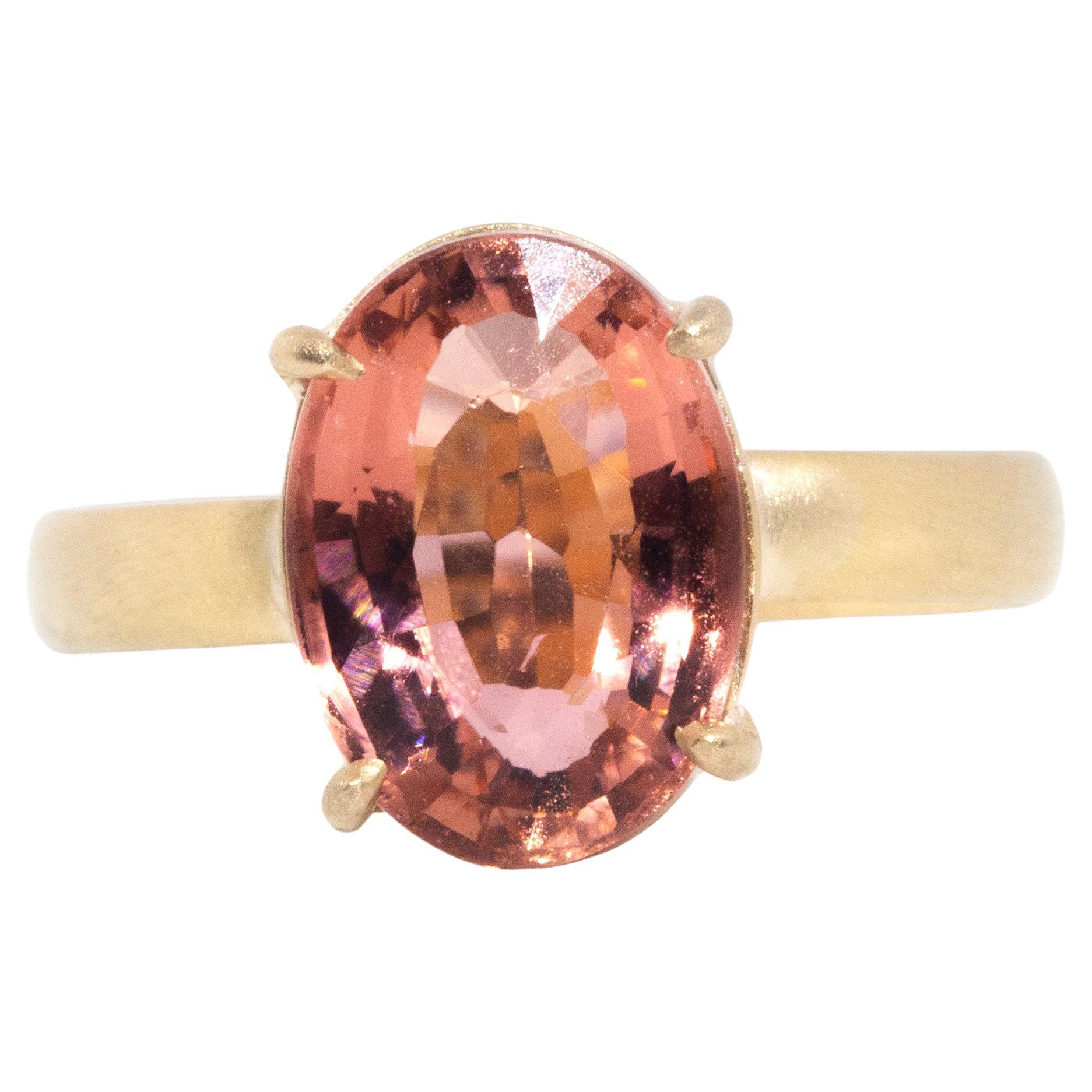 Circa 1980s Oval Peach Tourmaline Vintage 14 Carat Satin Gold Solitaire Ring